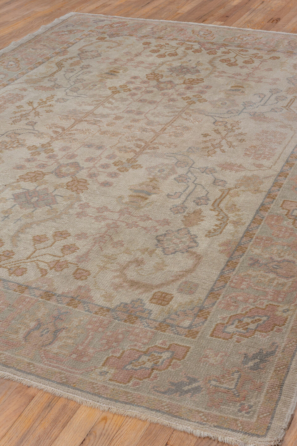 6' x 9' one-of-a-kind handmade antique Oushak medium size rug. Color palette: ivory, blush, taupe, sage, gold, rose, camel