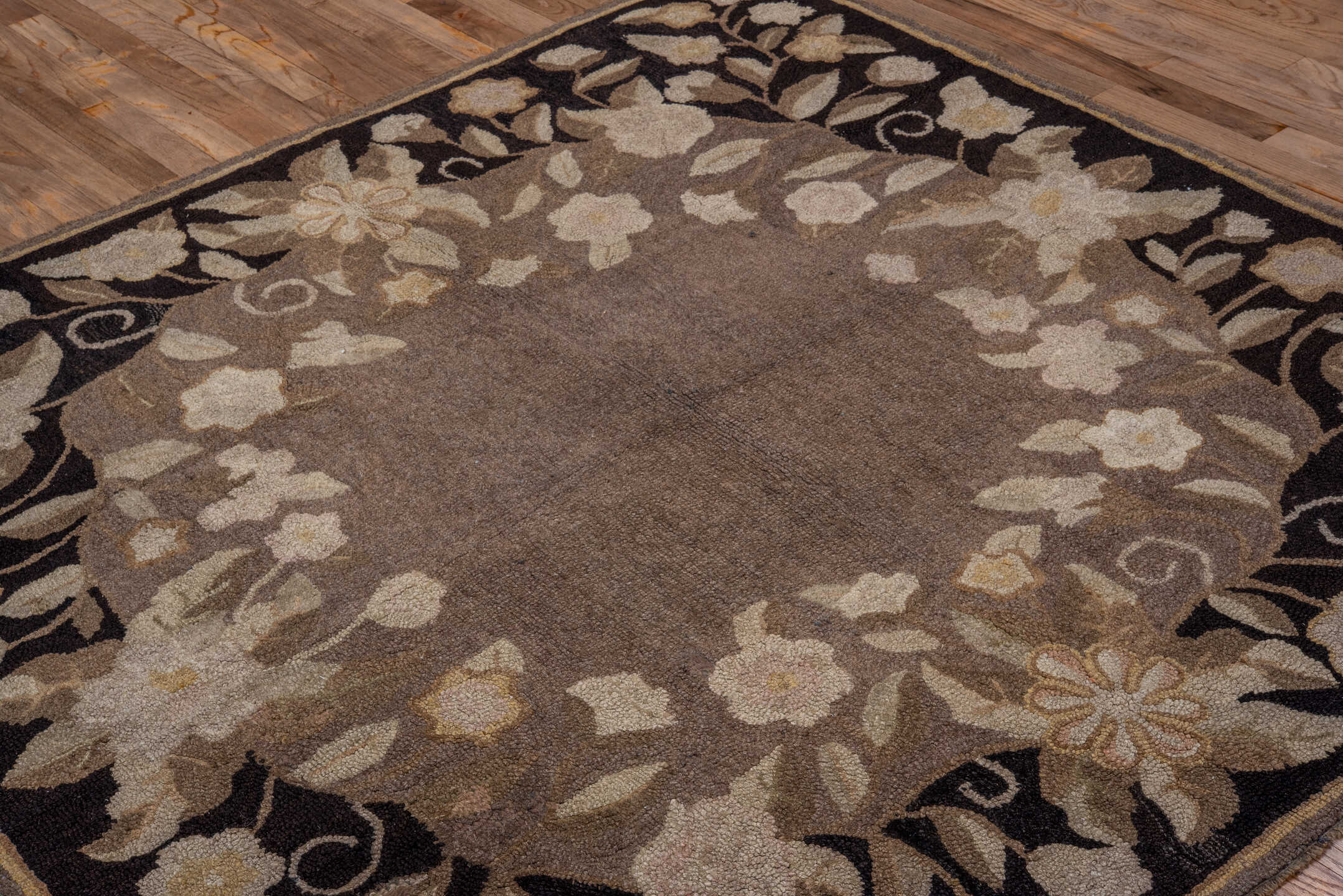 5' x 5' one-of-a-kind handmade antique Hooked rug. Color palette: taupe, brown, ivory, beige, cream, camel, gray
