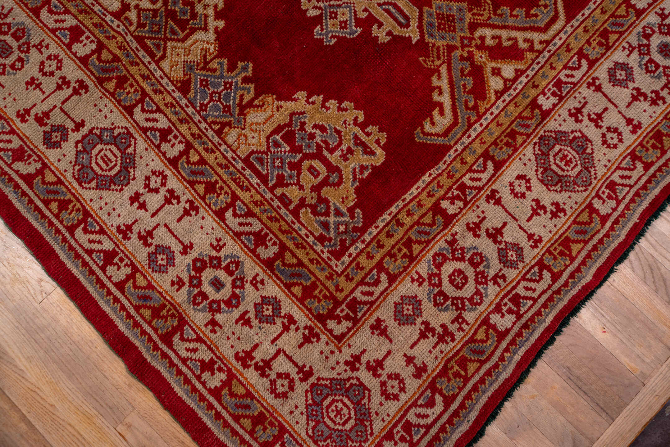 10' x 15' one-of-a-kind handmade antique Oushak rug. Color palette: rust, ivory, gold, blue, crimson, camel, terracotta