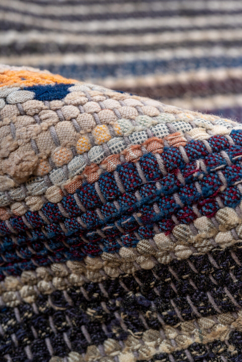 4' x 7' one-of-a-kind handmade vintage Rag Rug rug. Color palette: black, blue, brown, gray, light gray, off-white, orange