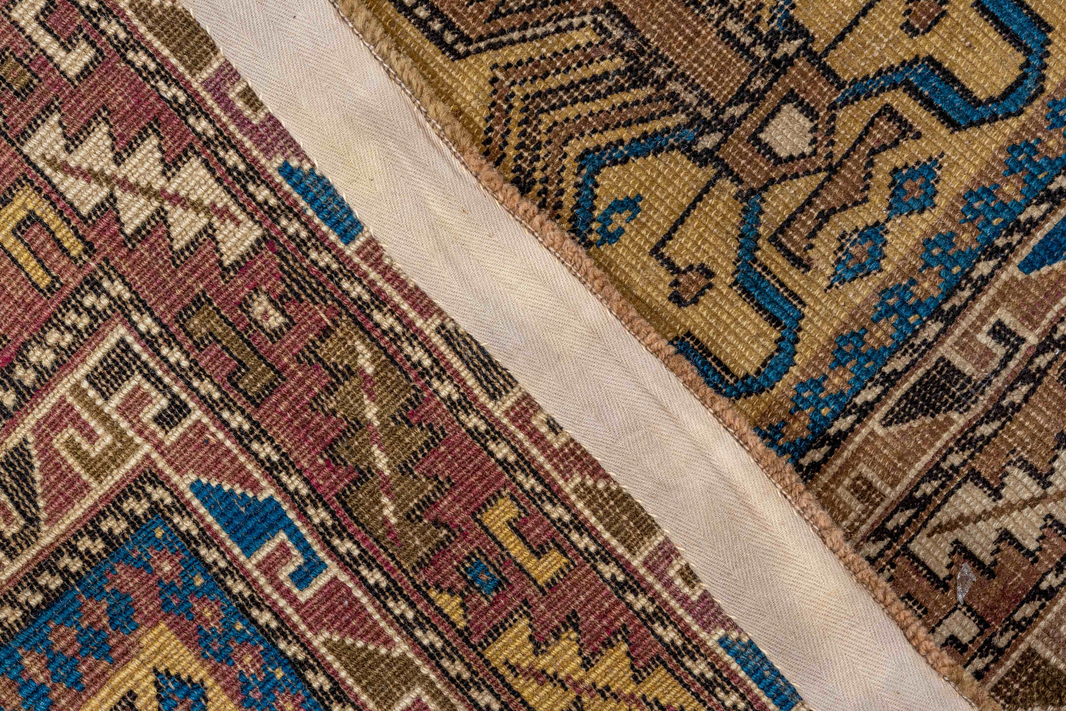 4' x 5' one-of-a-kind handmade antique Cabistan small size rug. Color palette: camel, brown, navy, ivory, taupe, charcoal