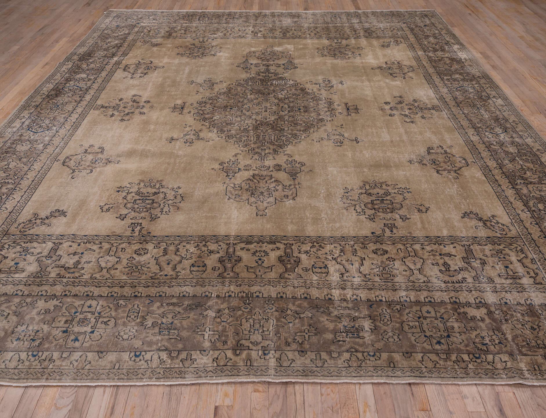 10' x 13' one-of-a-kind handmade antique Sparta large size rug. Color palette: camel, taupe, brown, slate, ivory, charcoal
