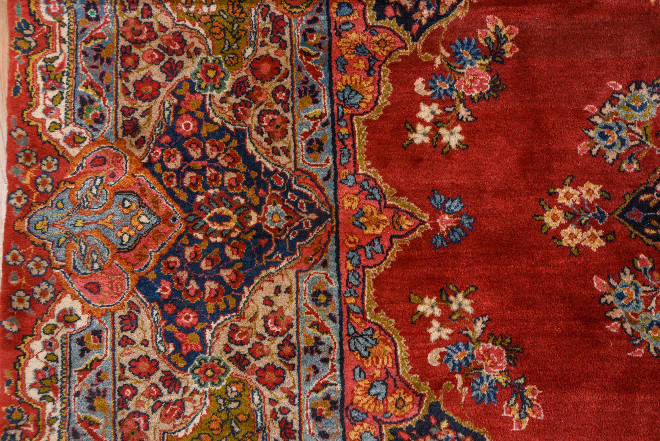 10' x 13' one-of-a-kind handmade antique Sarouk large size rug. Color palette: red, navy, ivory, sky blue, rose, gold, camel