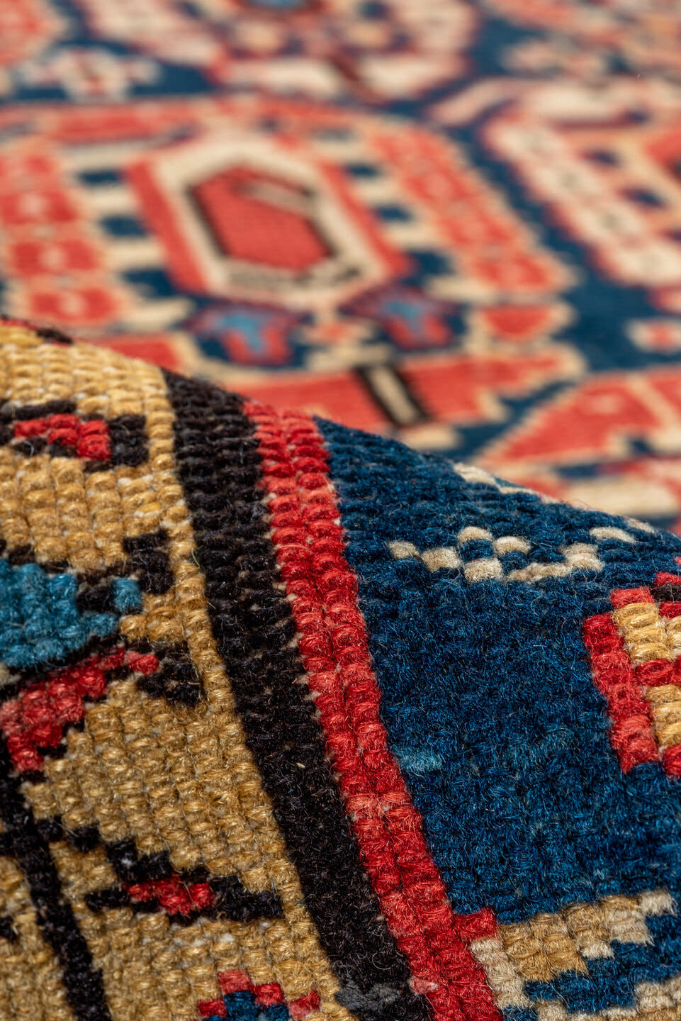 3' x 9' one-of-a-kind handmade antique Kuba runner rug. Color palette: indigo, ivory, rust, sky blue, camel, crimson, navy