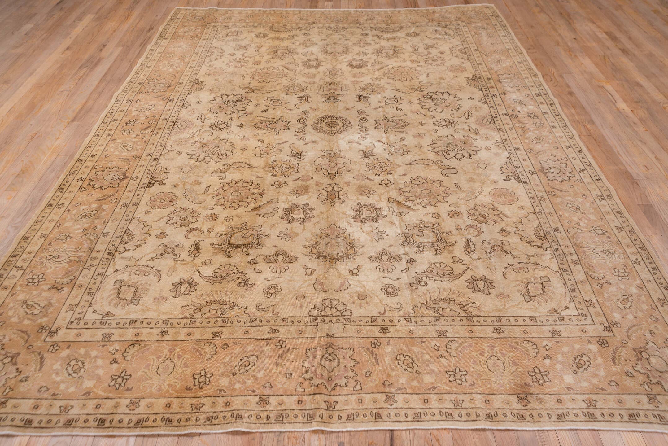 7' x 10' one-of-a-kind handmade antique Tabriz large size rug. Color palette: ivory, blush, taupe, camel, rose, beige, brown