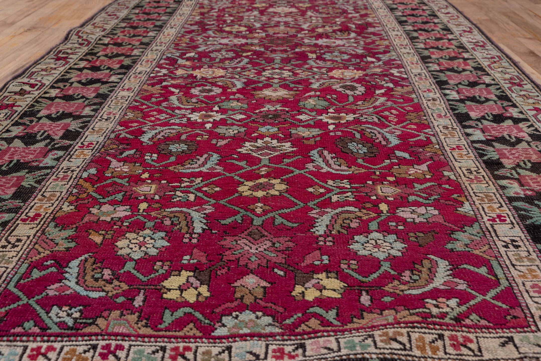 4' x 19' one-of-a-kind handmade vintage Karabagh runner rug. Color palette: brown, gray, pink, red