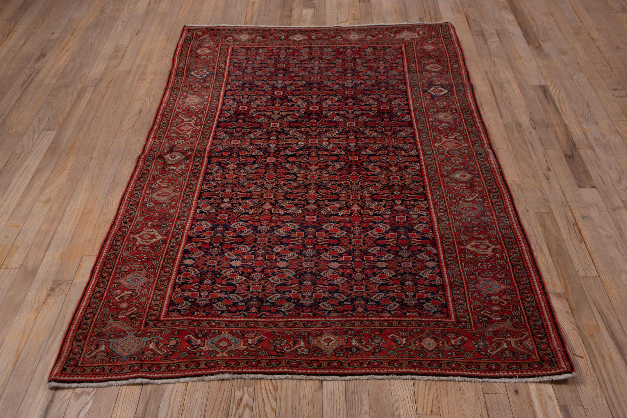 4' x 6' one-of-a-kind handmade antique Far.Sarouk small size rug. Color palette: navy, rust, crimson, ivory, rose, charcoal