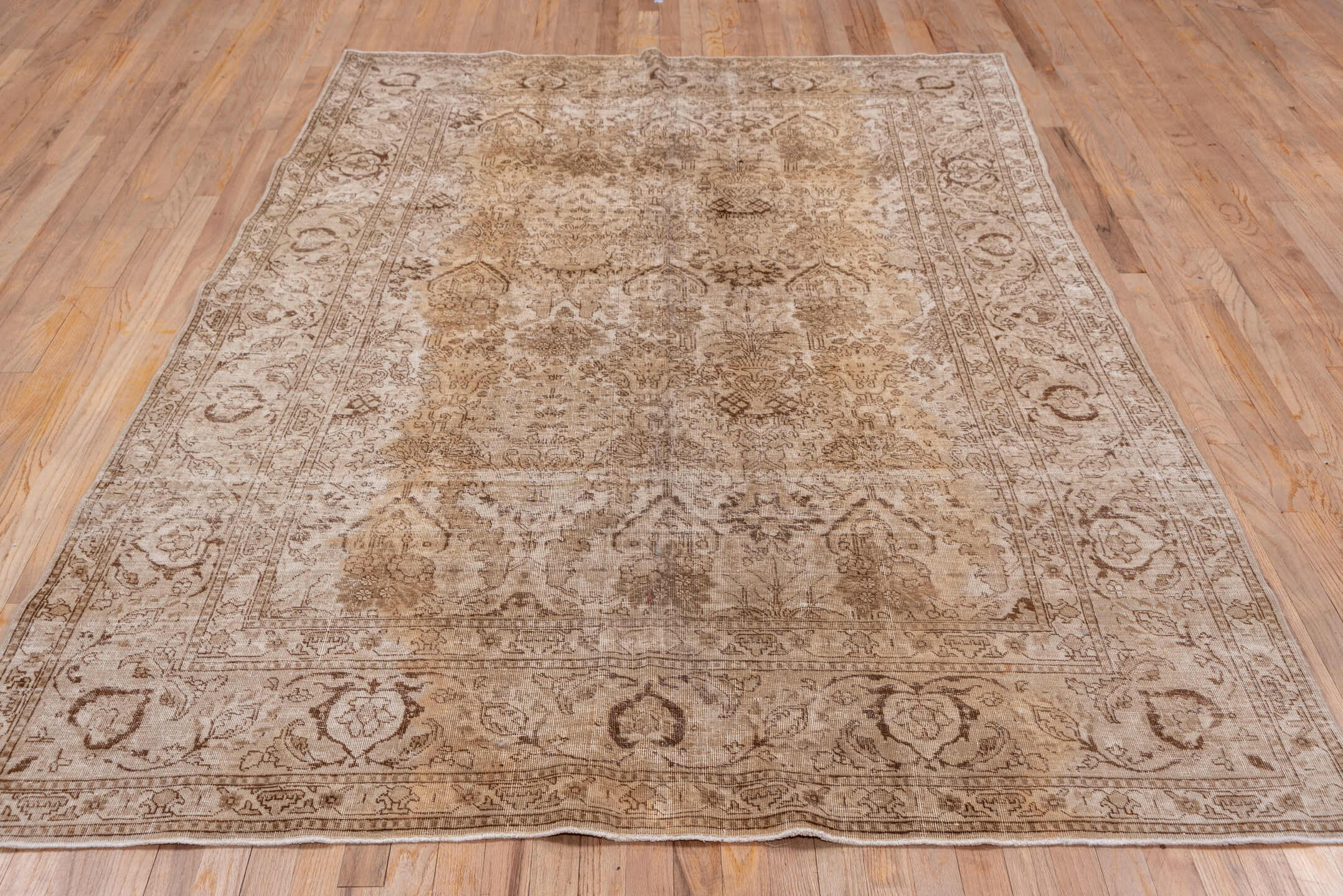 6' x 8' one-of-a-kind handmade antique Tabriz medium size rug. Color palette: taupe, beige, brown, camel, ivory, gray
