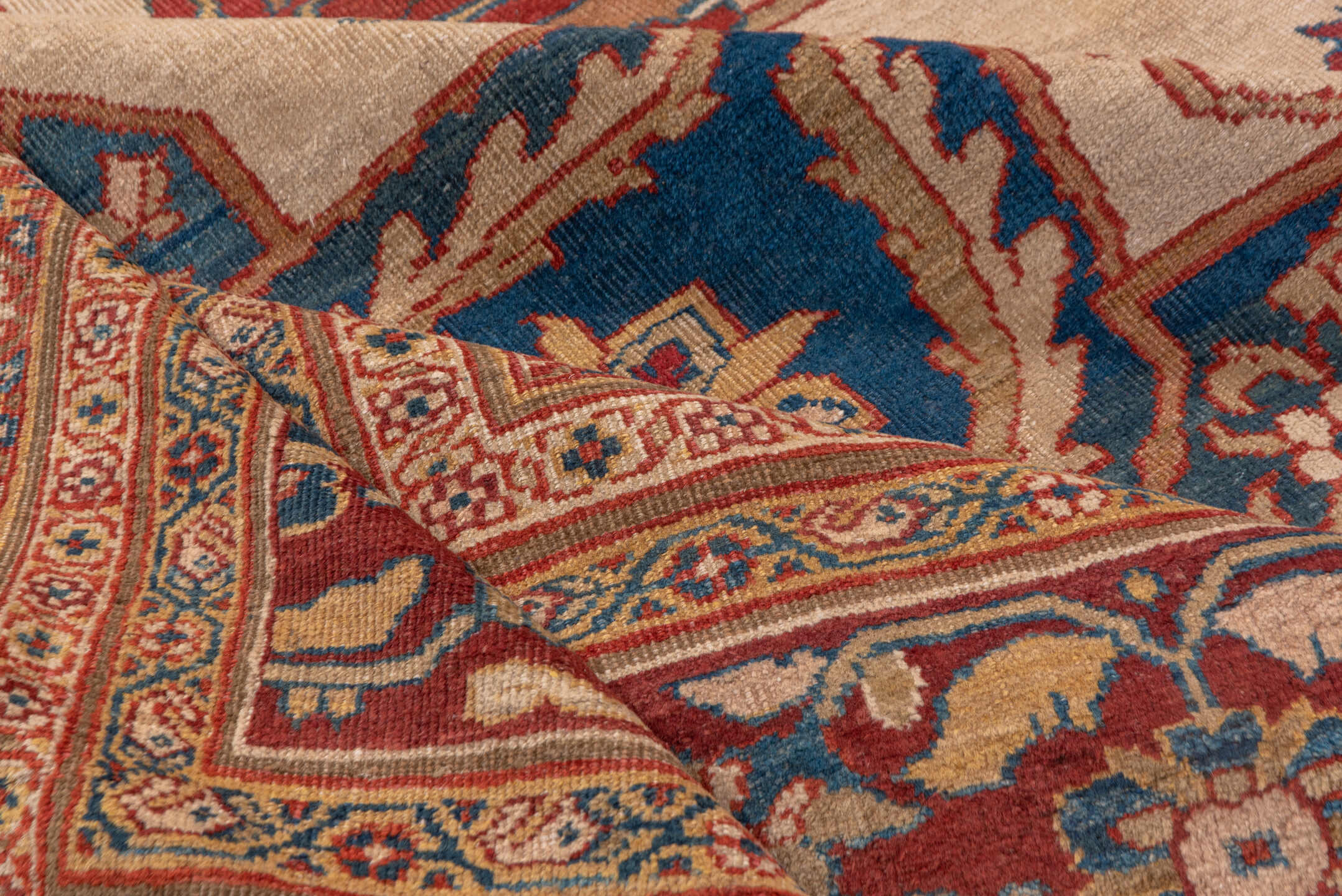 12' x 14' one-of-a-kind handmade antique Sultanabad oversize rug. Color palette: ivory, rust, brick red, indigo, soft blue