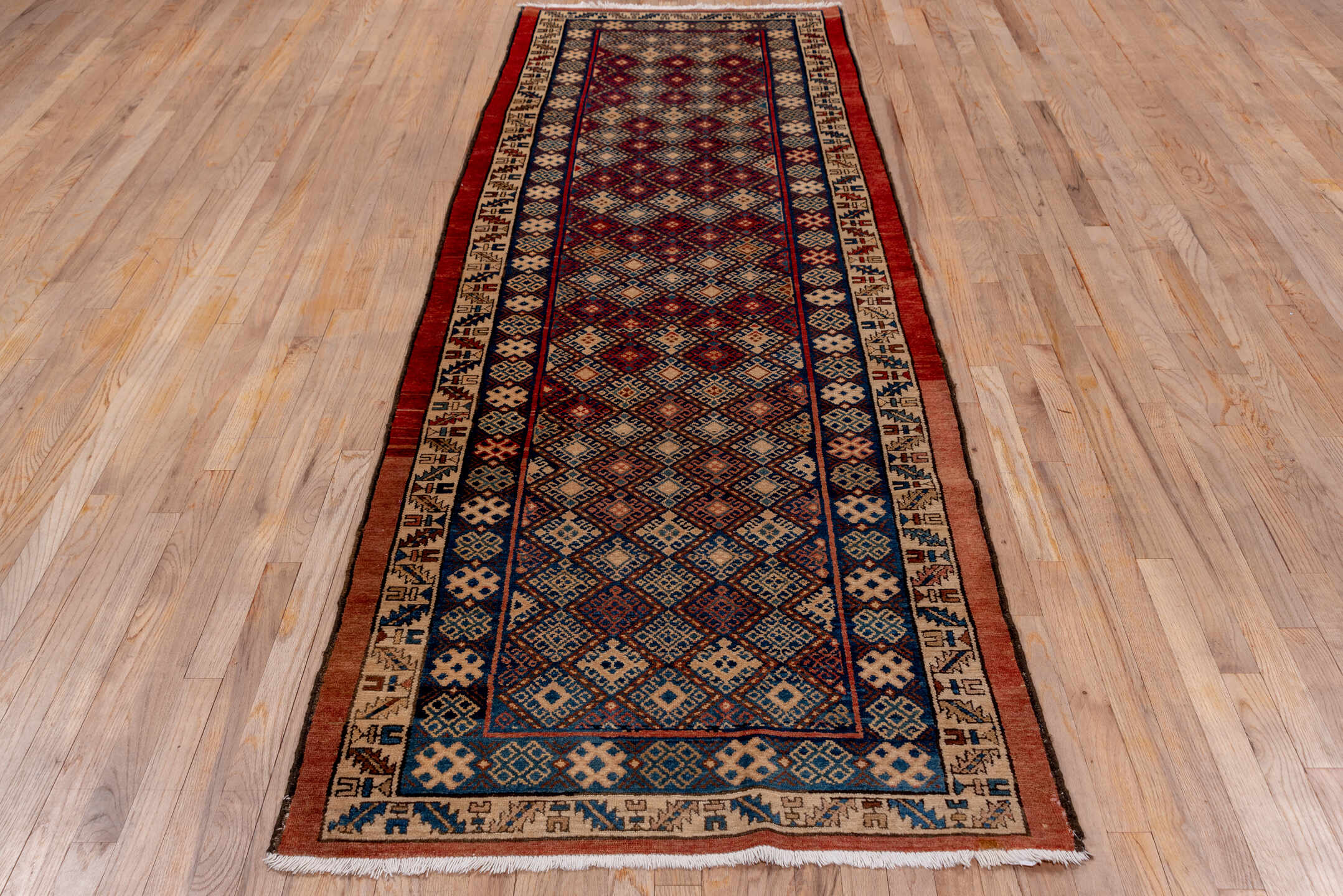 3' x 10' one-of-a-kind handmade antique Malayer runner rug. Color palette: indigo, ivory, rust, brick, camel, navy, purple