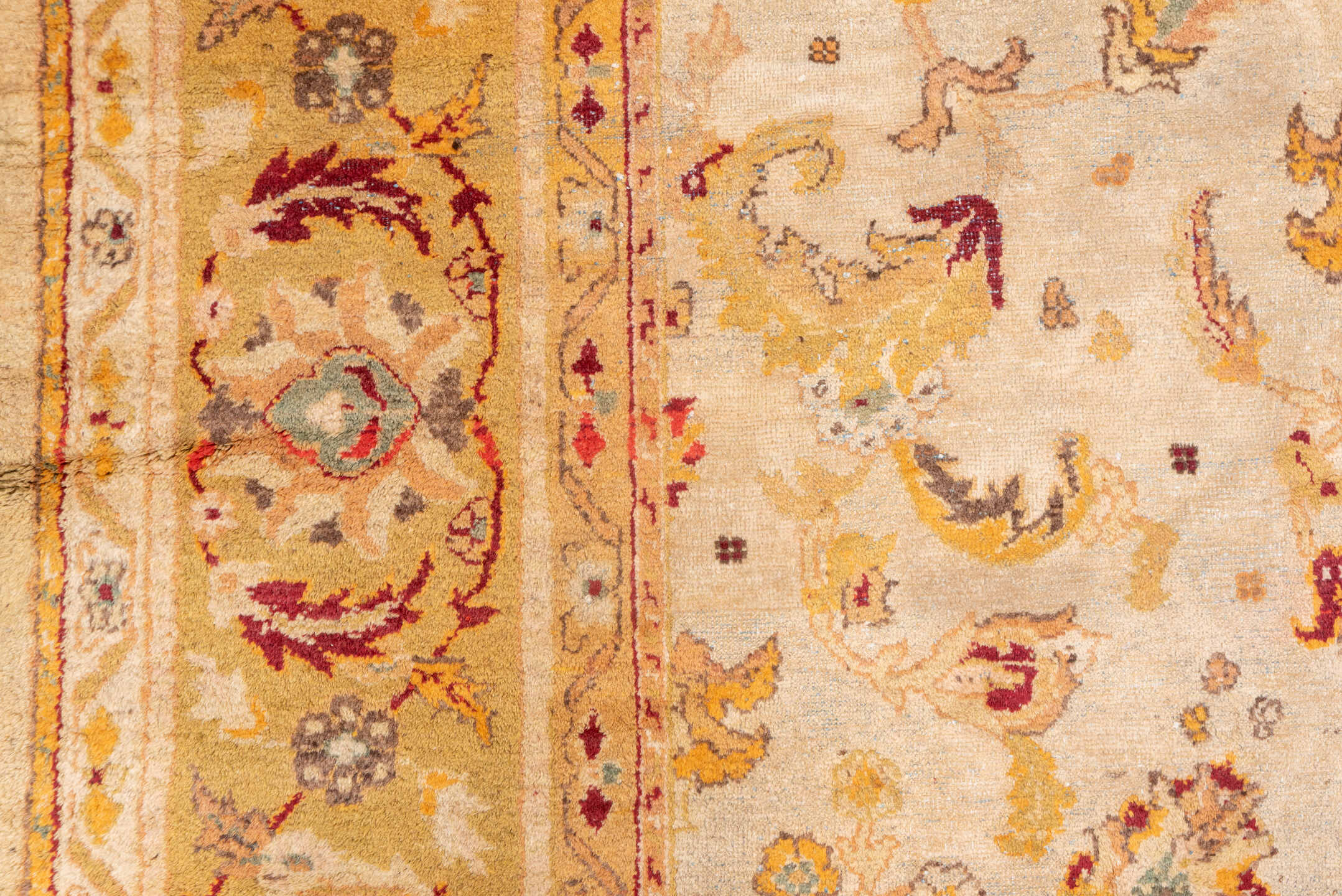 9' x 11' one-of-a-kind handmade antique Amritzar large size rug. Color palette: ivory, gold, camel, saffron, taupe, burgundy