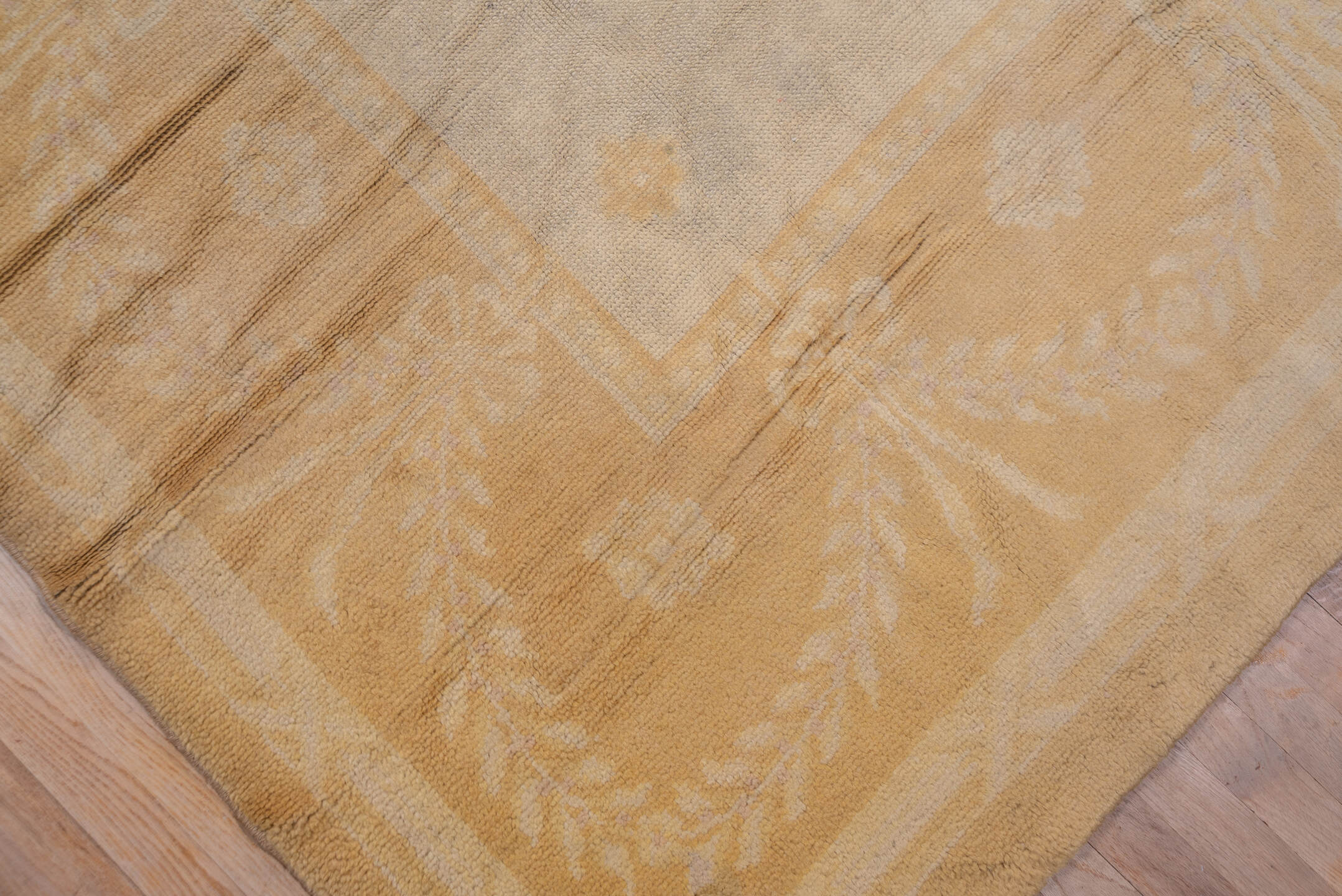 10' x 17' one-of-a-kind handmade vintage Savonnerie rug. Color palette: brown, gray, off-white, orange, pink, tan