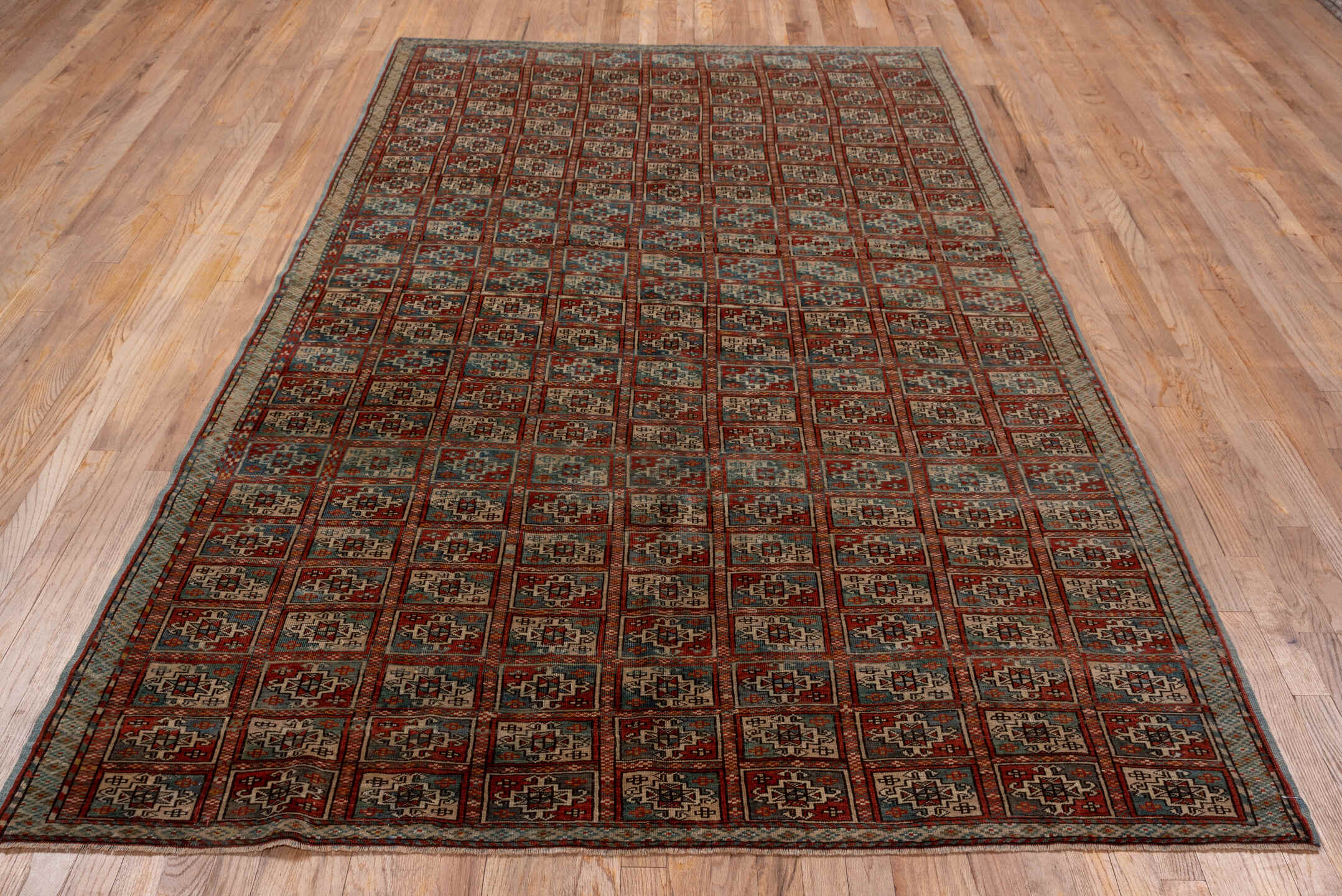 3' x 11' one-of-a-kind handmade vintage Bokara runner rug. Color palette: rust, ivory, blue gray, charcoal, taupe, burgundy