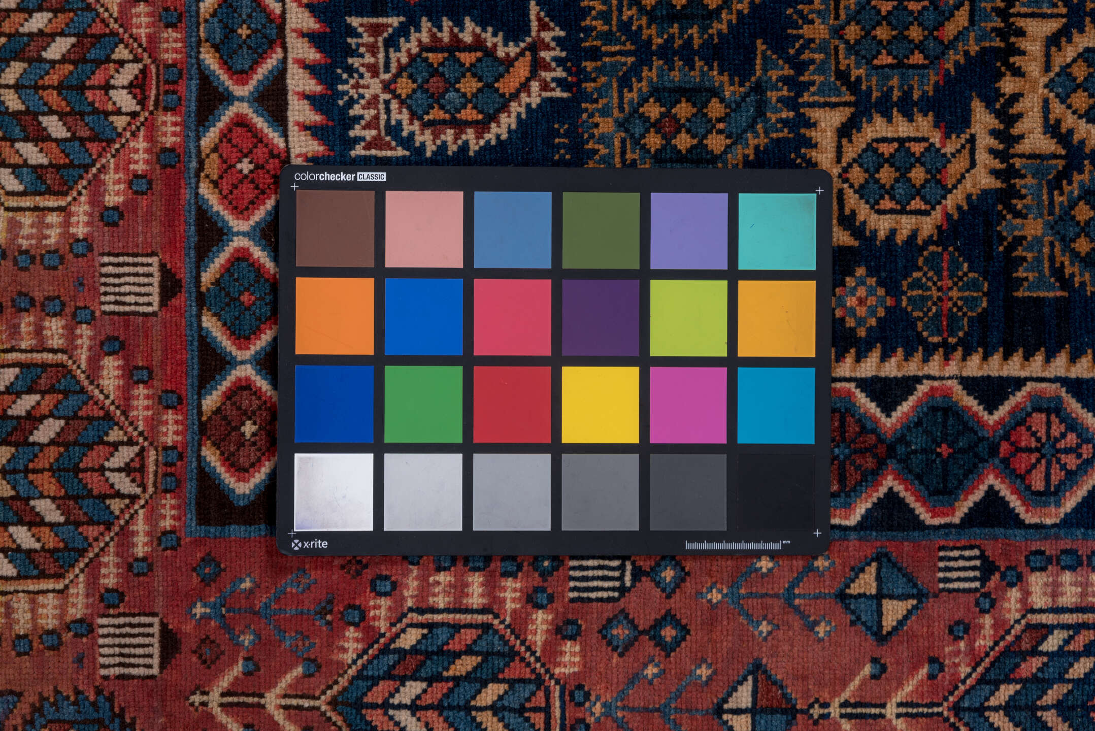 3' x 9' one-of-a-kind handmade vintage Kilim runner rug. Color palette: black, blue, brown, gray, pink, red, redwood, wine