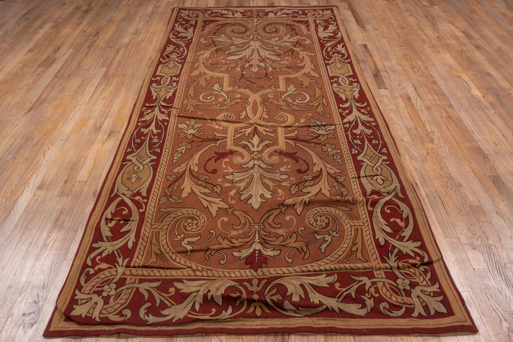 5' x 10' one-of-a-kind handmade antique Aubusson runner rug. Color palette: rose, ivory, burgundy, terra cotta, taupe, camel