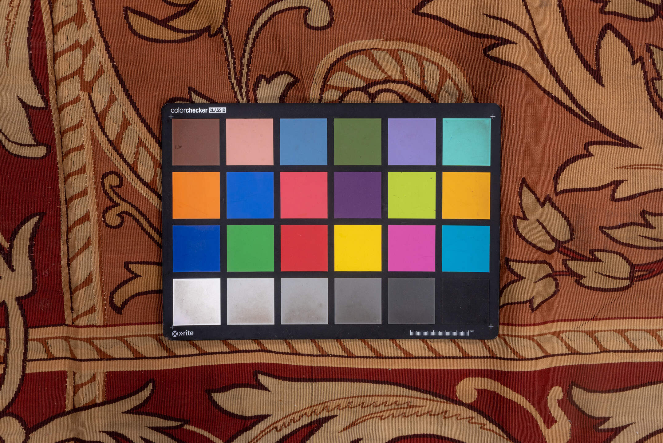 5' x 10' one-of-a-kind handmade vintage Aubusson runner rug. Color palette: brown, gray, pink, red