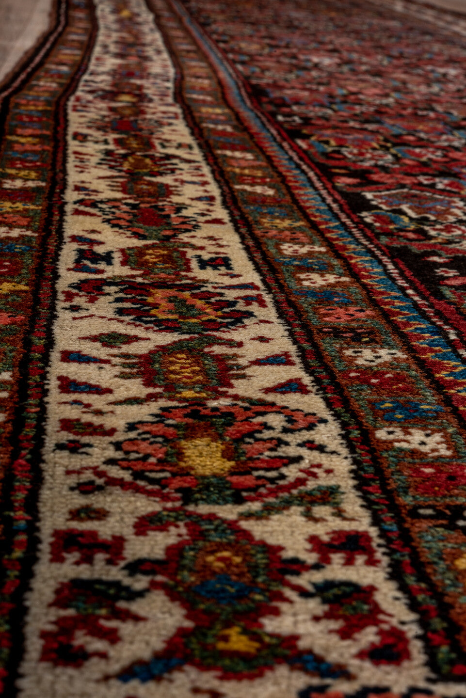 3' x 13' one-of-a-kind handmade vintage Malayer runner rug. Color palette: black, blue, brown, gray, pink, red
