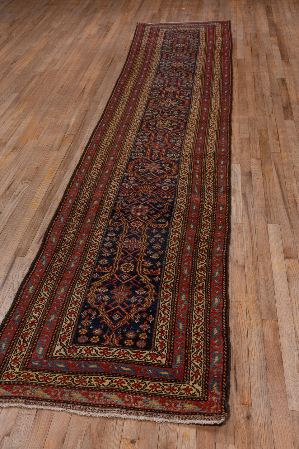 2' x 14' one-of-a-kind handmade antique Malayer runner rug. Color palette: navy, rust, ivory, brick, sky_blue, rose, camel