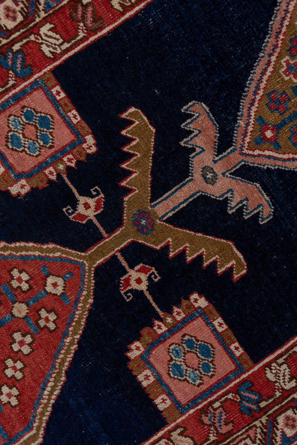 3' x 11' one-of-a-kind handmade antique Serapi runner rug. Color palette: navy, rust, ivory, camel, sky blue, rose, brown
