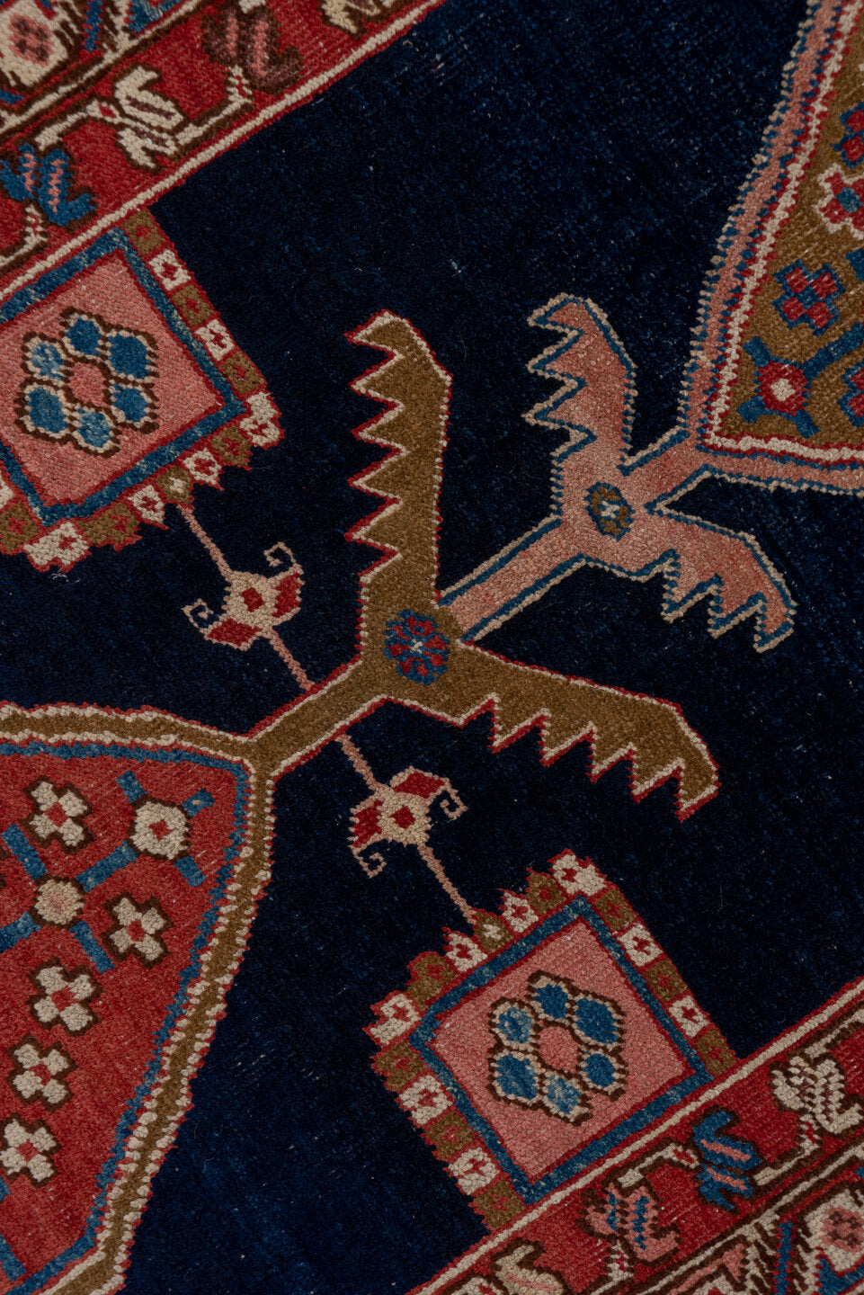 3' x 11' one-of-a-kind handmade vintage Serapi runner rug. Color palette: blue, brown, gray, pink, red
