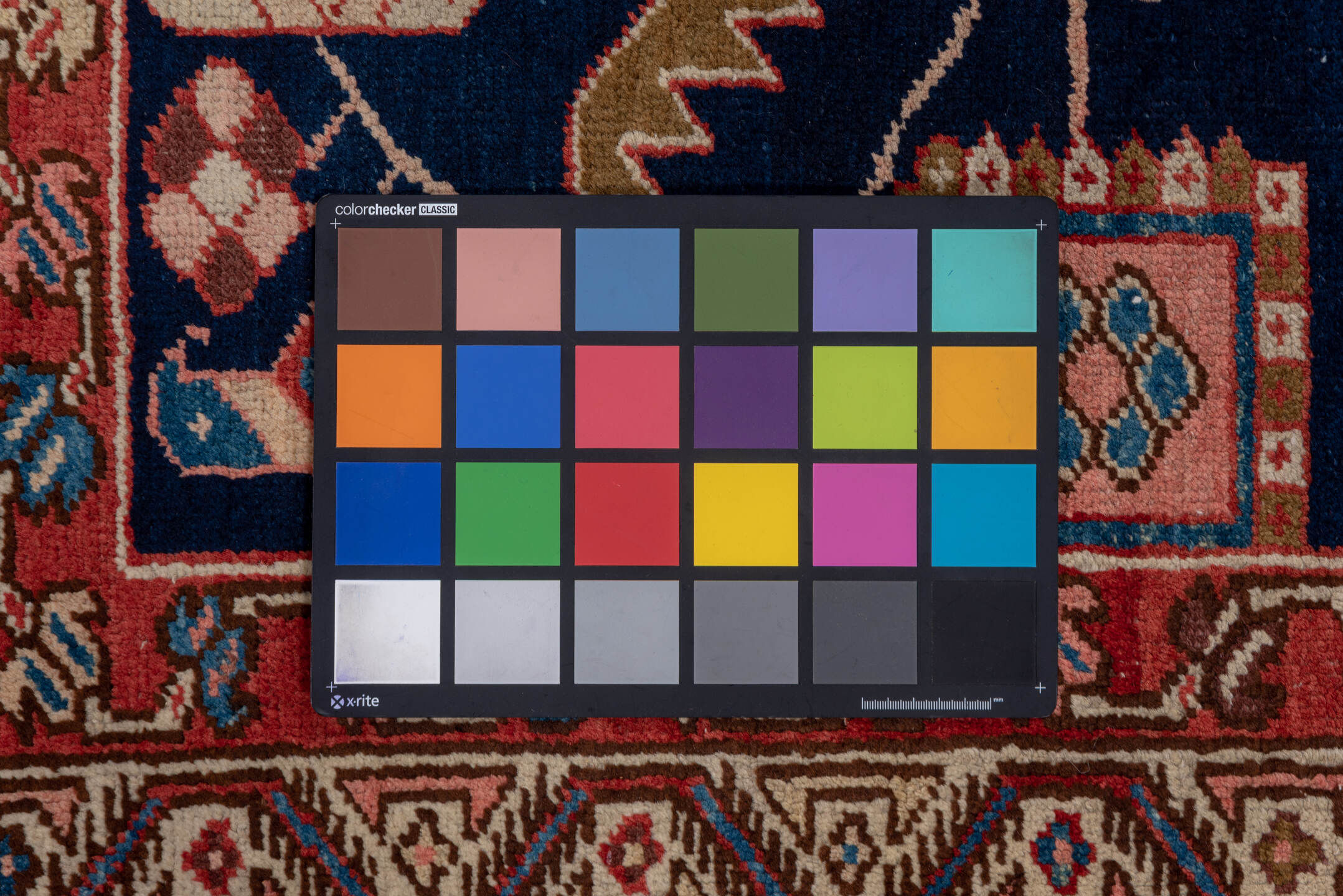 3' x 11' one-of-a-kind handmade vintage Serapi runner rug. Color palette: blue, brown, gray, pink, red