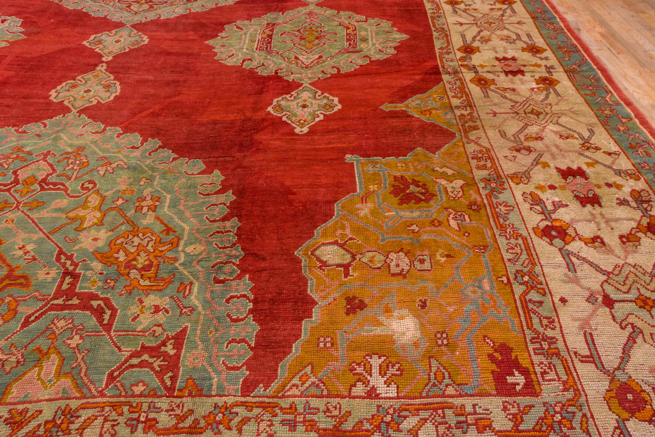 18' x 26' one-of-a-kind handmade antique Oushak oversize rug. Color palette: red, ivory, pale blue, gold, rust, coral, sage