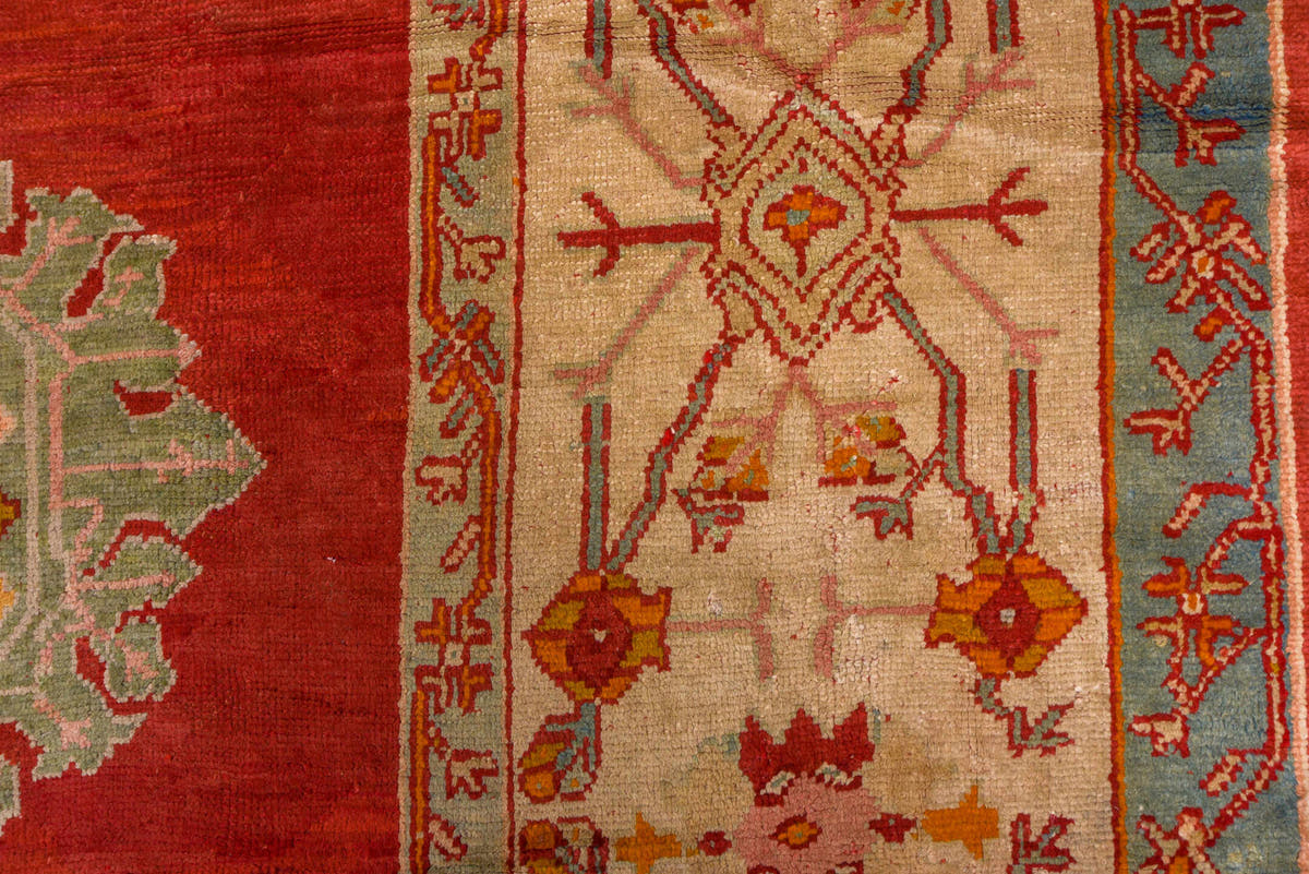 18' x 26' one-of-a-kind handmade antique Oushak oversize rug. Color palette: red, ivory, pale blue, gold, rust, coral, sage