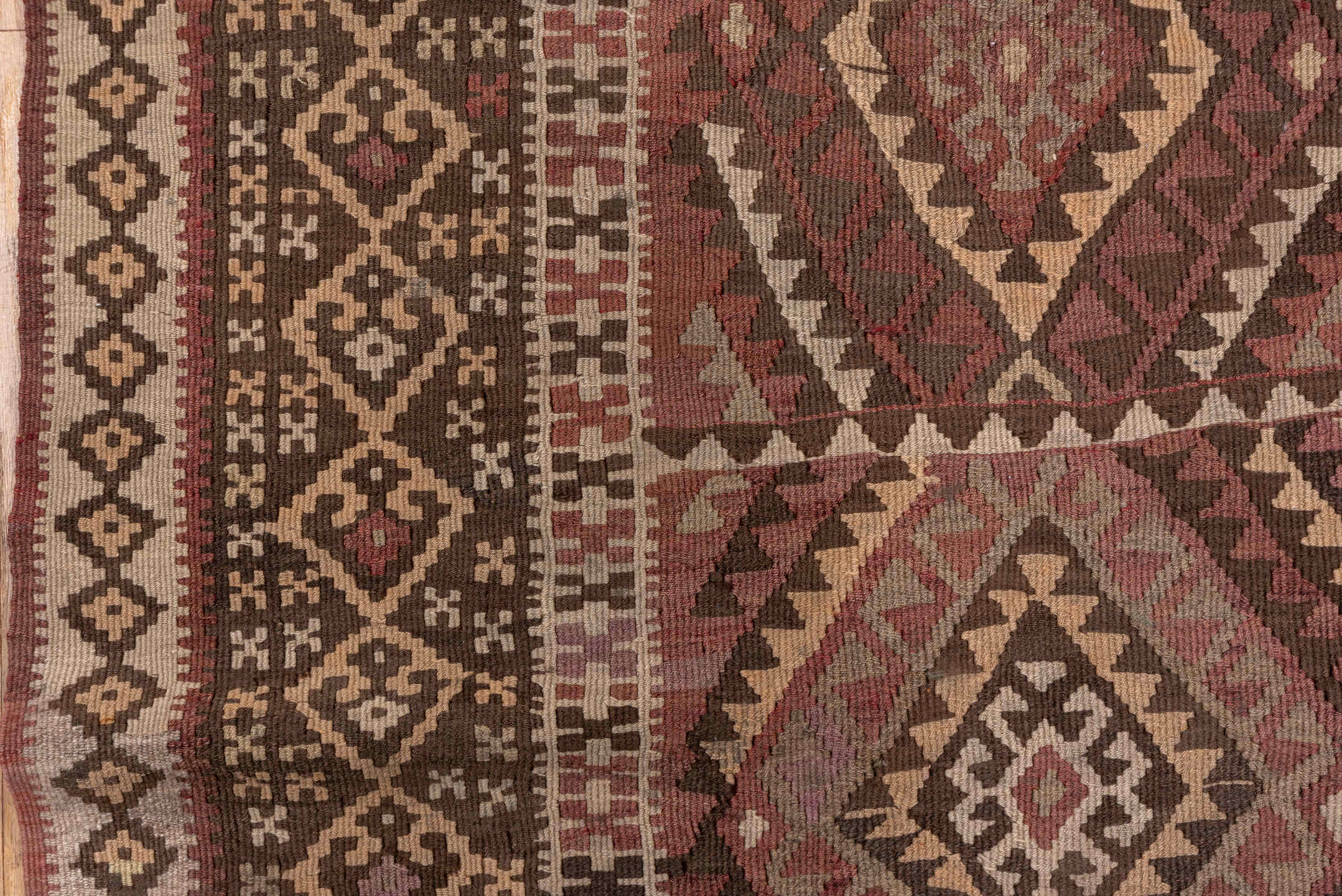4' x 11' one-of-a-kind handmade vintage Kilim runner rug. Color palette: rose, rust, brown, ivory, taupe, mauve, pink, red