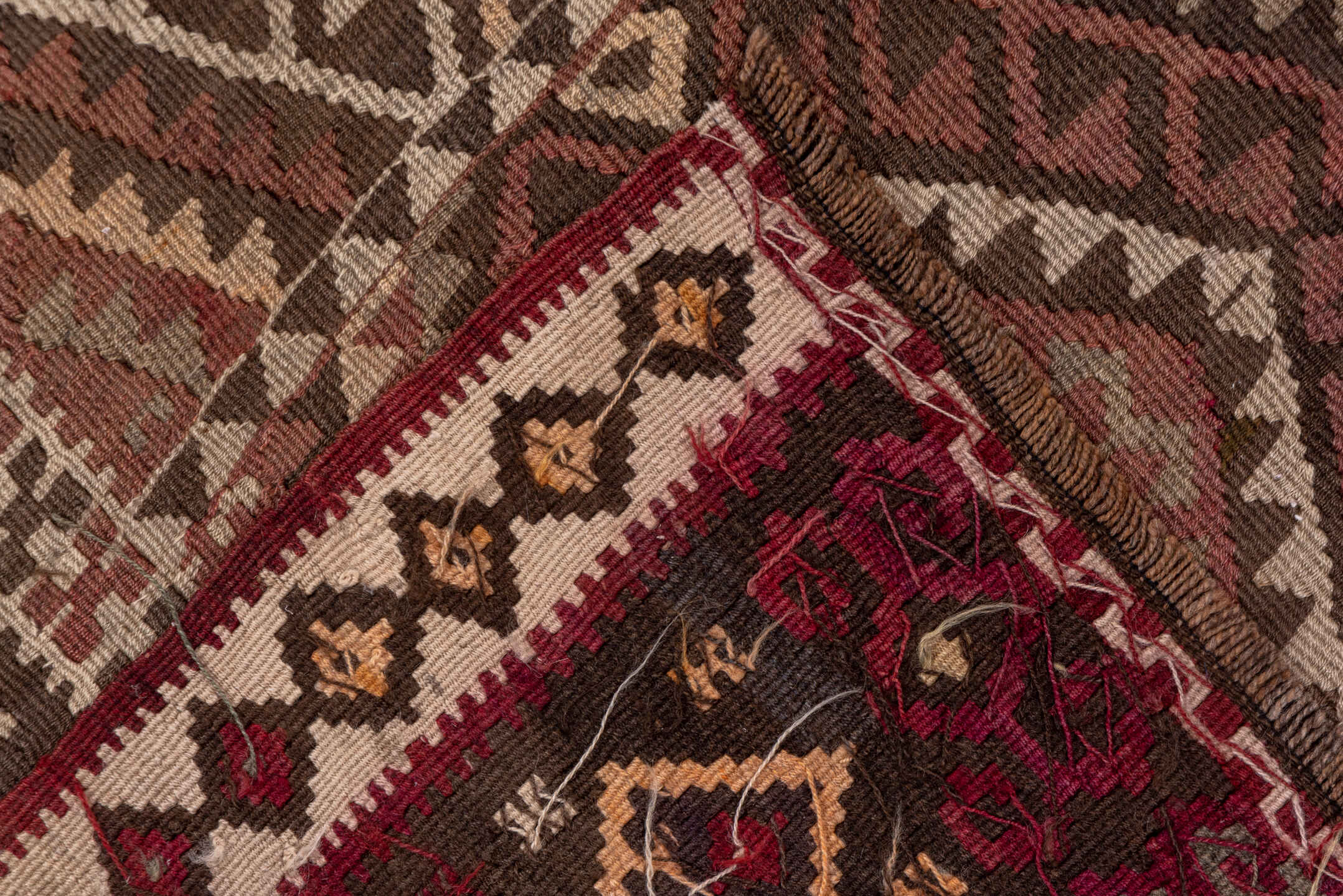 4' x 11' one-of-a-kind handmade vintage Kilim runner rug. Color palette: rose, rust, brown, ivory, taupe, mauve, pink, red