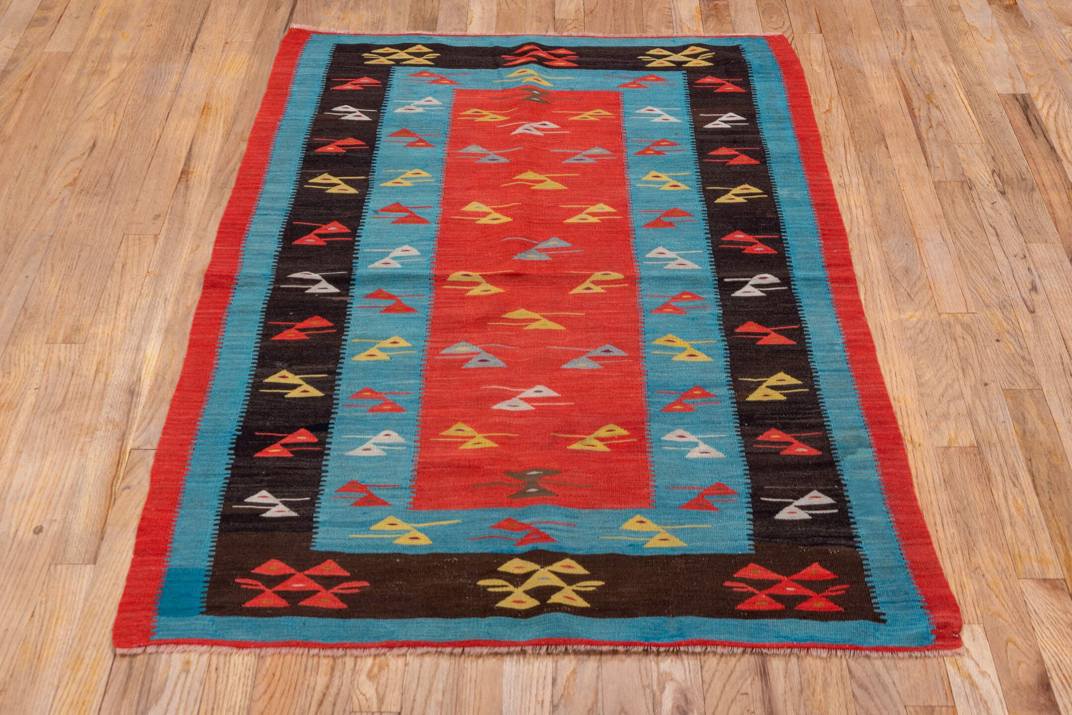 3' x 5' one-of-a-kind handmade antique Kilim small size rug. Color palette: coral, sky_blue, espresso, red, ivory