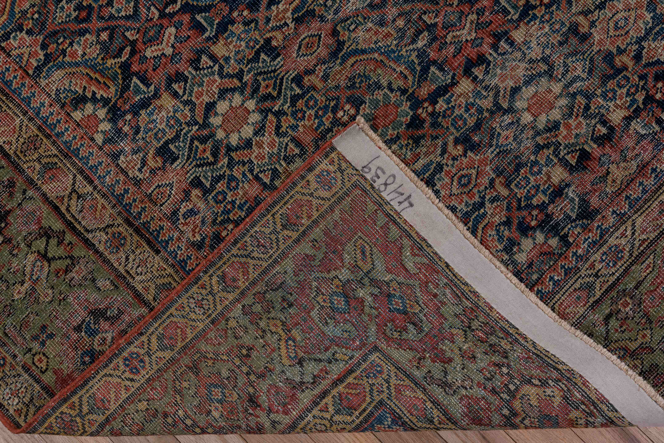5' x 9' one-of-a-kind handmade antique Farahan medium size rug. Color palette: navy, olive, rust, ivory, terra cotta, sage