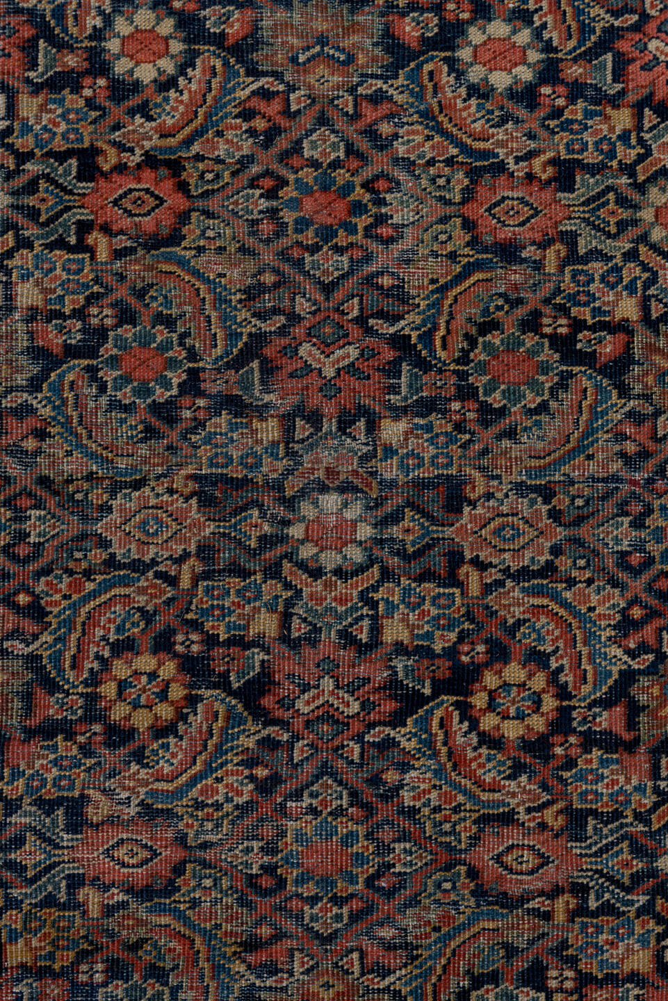 5' x 9' one-of-a-kind handmade vintage Farahan medium size rug. Color palette: black, blue, brown, gray, pink, red, redwood