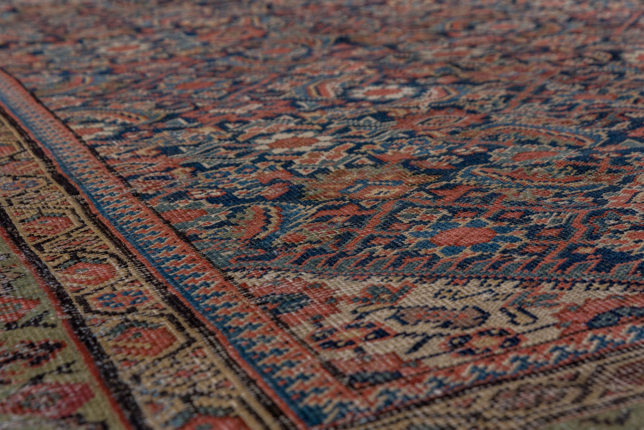 5' x 9' one-of-a-kind handmade antique Farahan medium size rug. Color palette: navy, olive, rust, ivory, terra cotta, sage