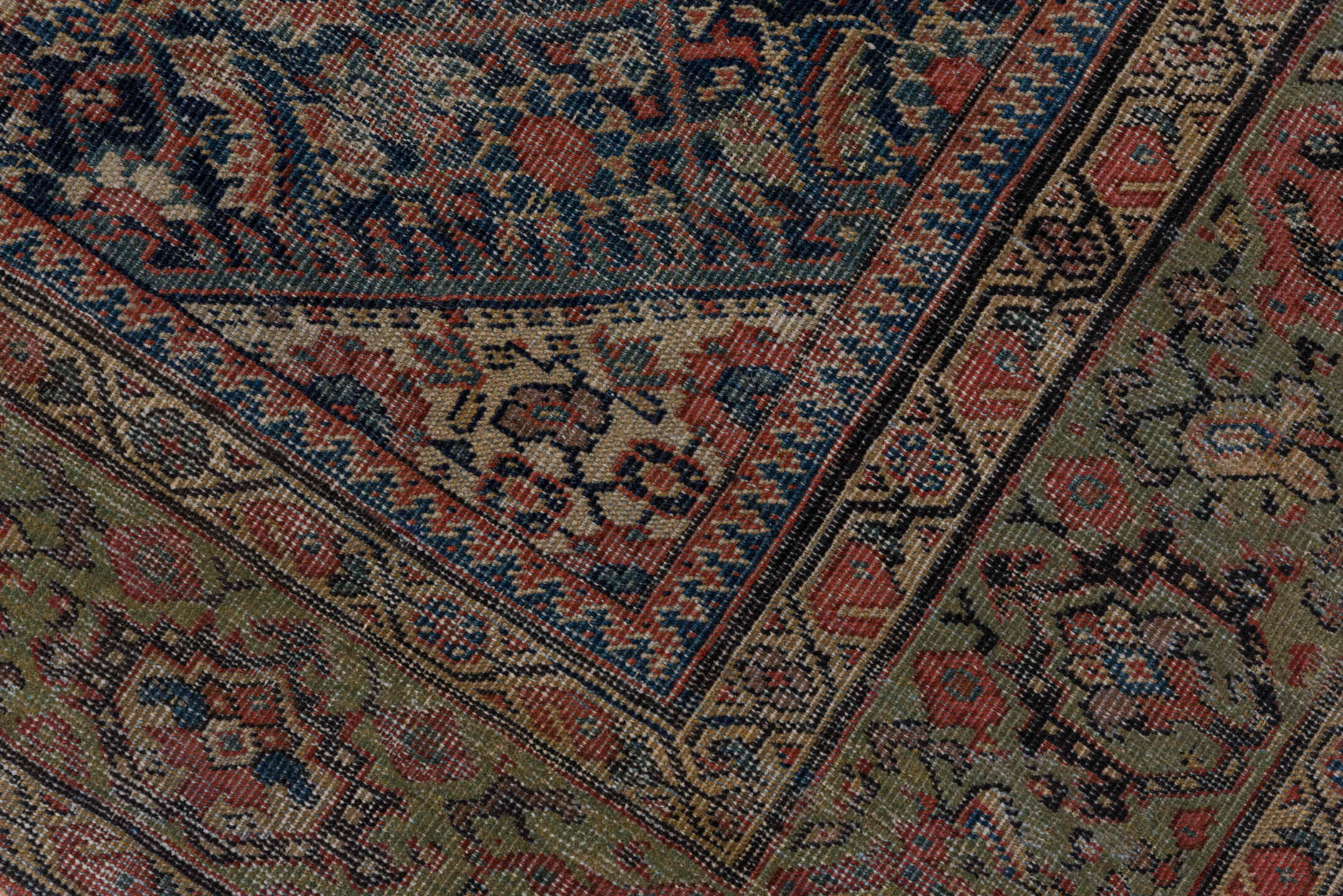 5' x 9' one-of-a-kind handmade antique Farahan medium size rug. Color palette: navy, olive, rust, ivory, terra cotta, sage