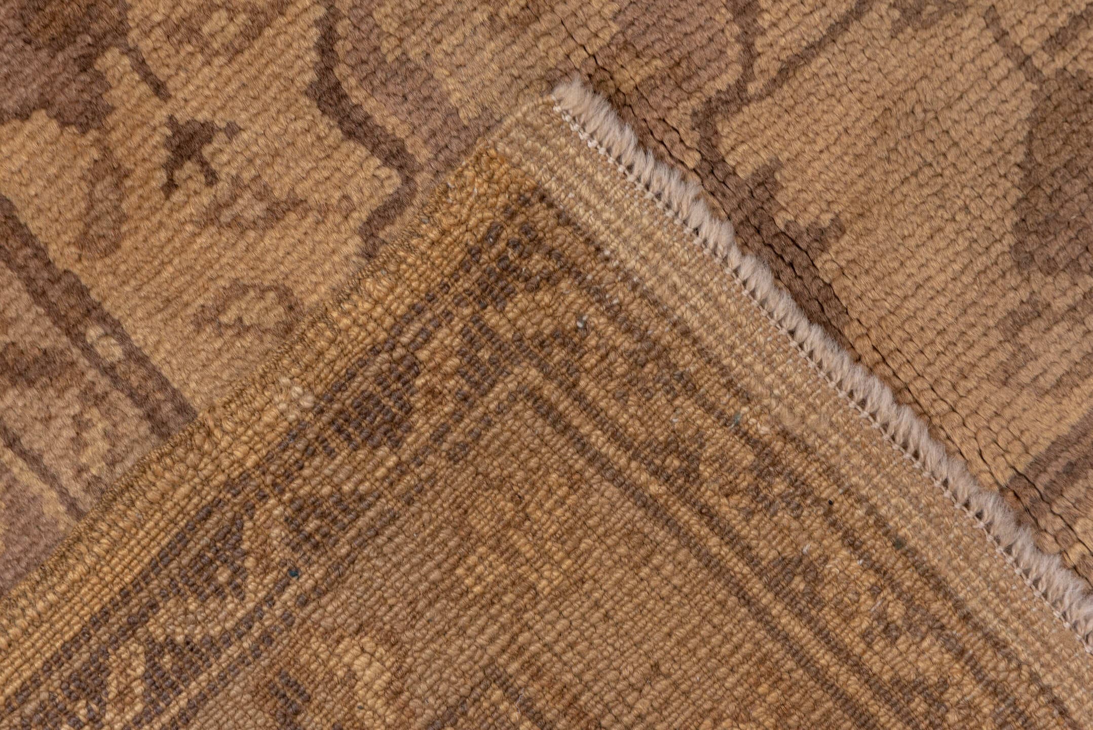 7' x 9' one-of-a-kind handmade antique Oushak rug. Color palette: beige, taupe, camel, brown, ivory, sand, mauve, gray, pink