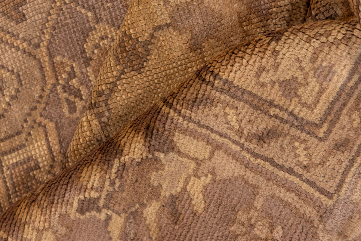 7' x 9' one-of-a-kind handmade antique Oushak rug. Color palette: beige, taupe, camel, brown, ivory, sand, mauve, gray, pink