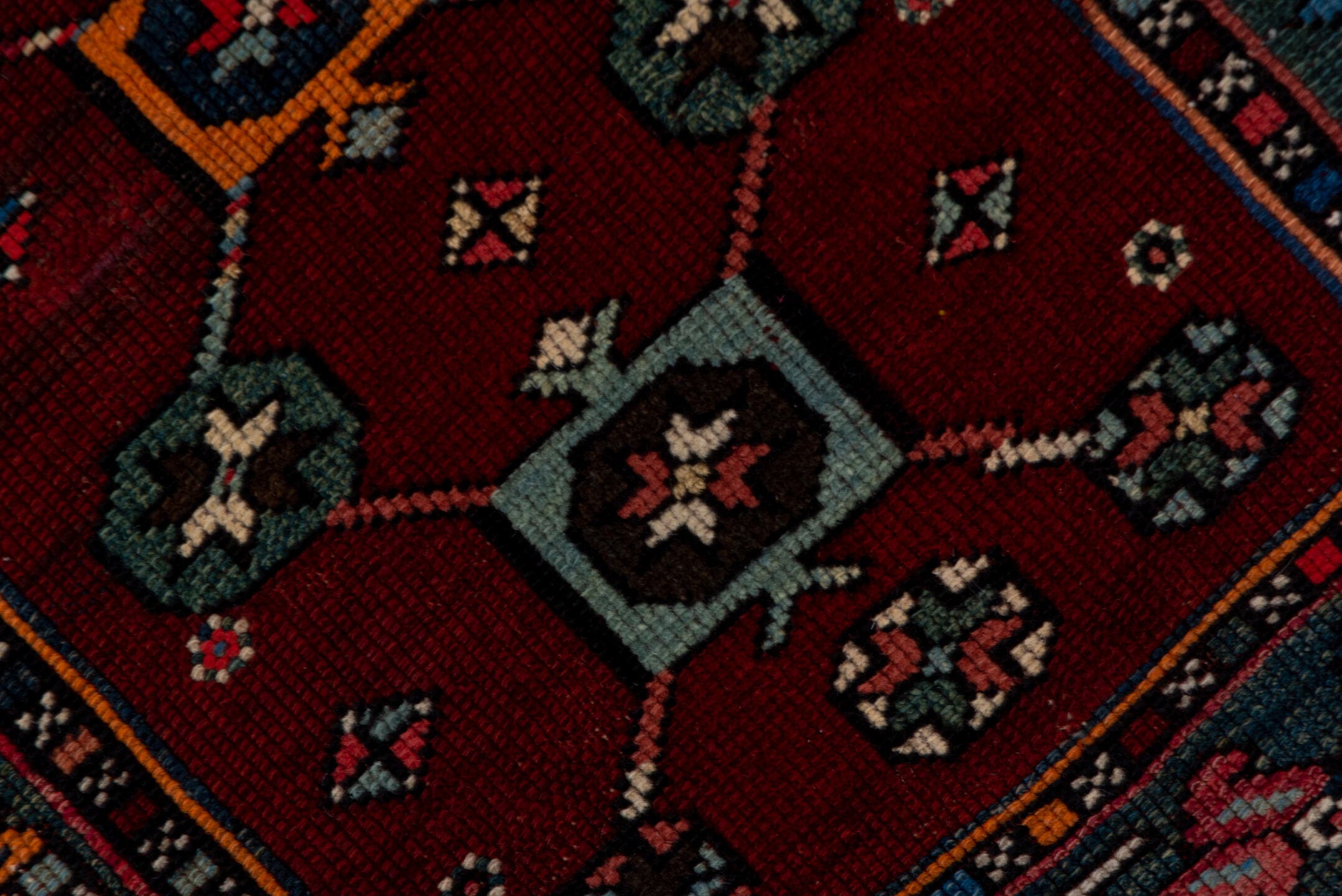 4' x 5' one-of-a-kind handmade antique Shirvan small size rug. Color palette: coral, burgundy, indigo, navy, ivory, slate