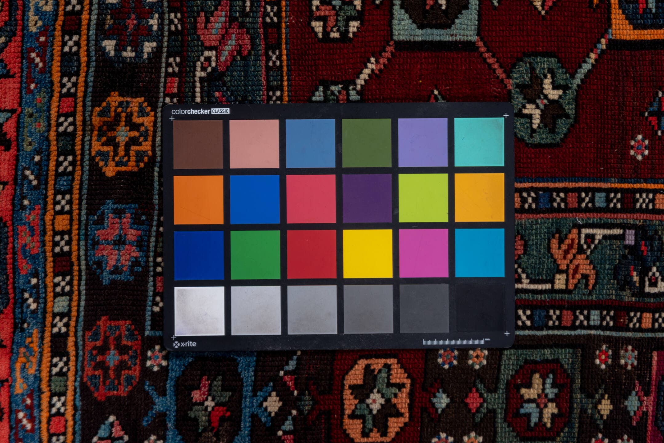 4' x 5' one-of-a-kind handmade antique Shirvan small size rug. Color palette: coral, burgundy, indigo, navy, ivory, slate