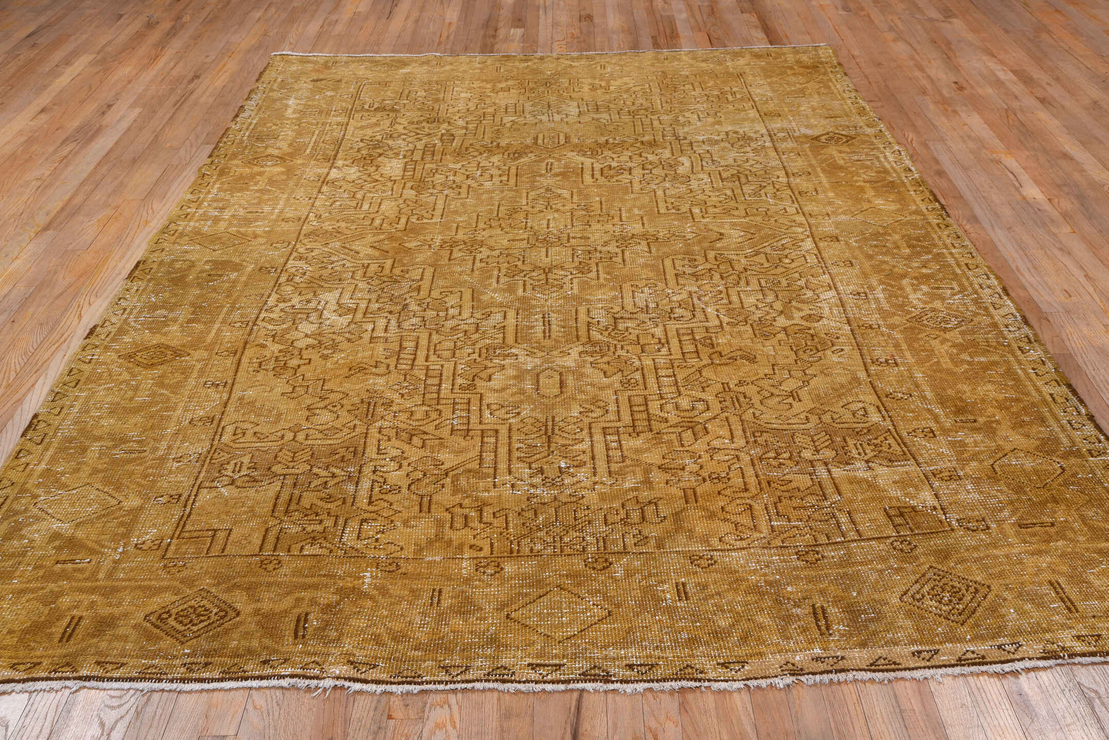 7' x 9' one-of-a-kind handmade vintage Heriz rug. Color palette: brown, burlywood, off-white, orange, tan