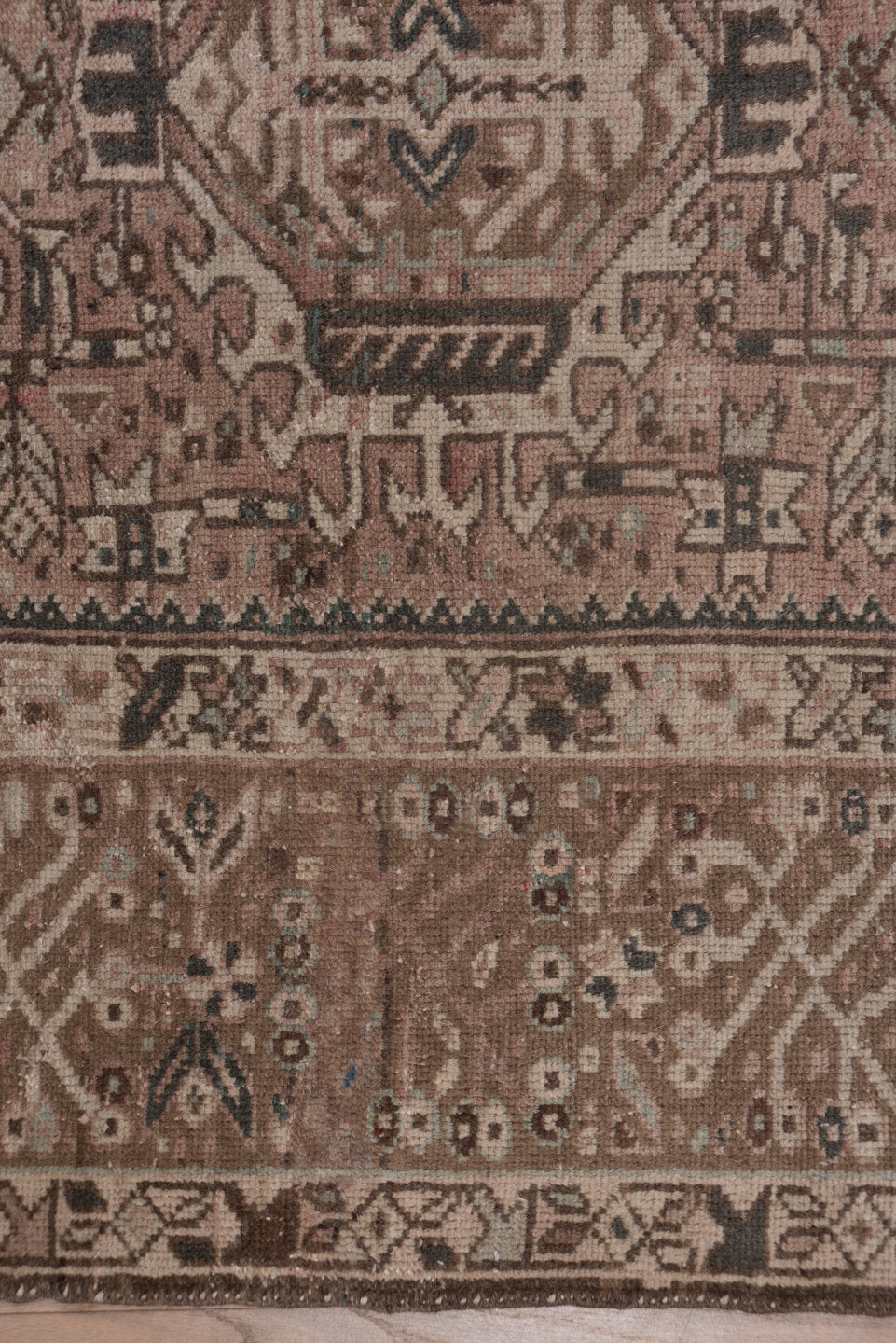 7' x 10' one-of-a-kind handmade vintage Karaje large size rug. Color palette: brown, gray, light gray, off-white, pink, snow