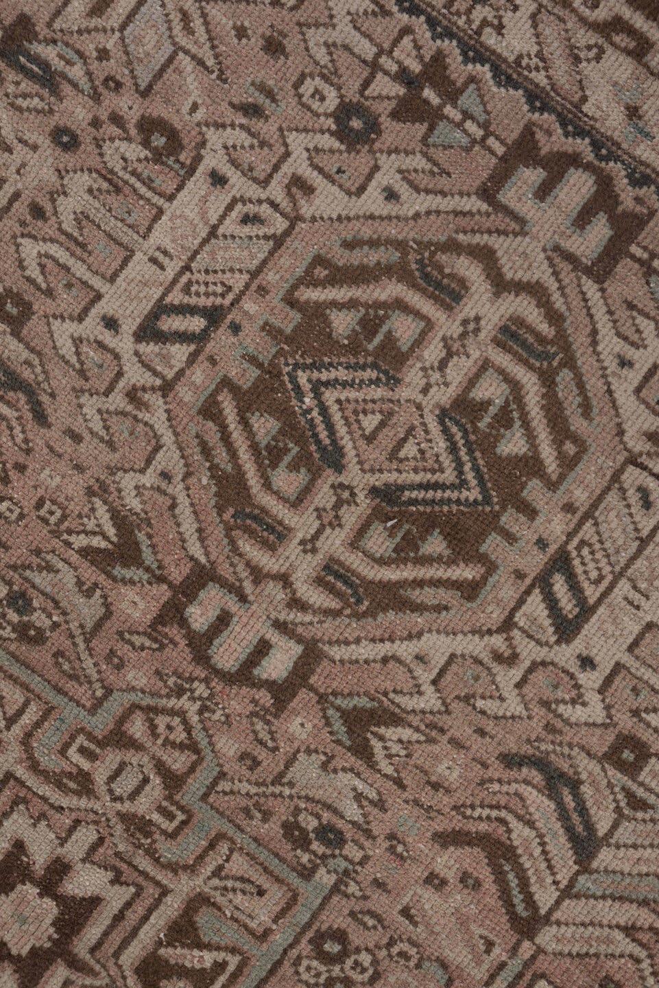 7' x 10' one-of-a-kind handmade antique Karaje large size rug. Color palette: taupe, rose, brown, ivory, charcoal, slate