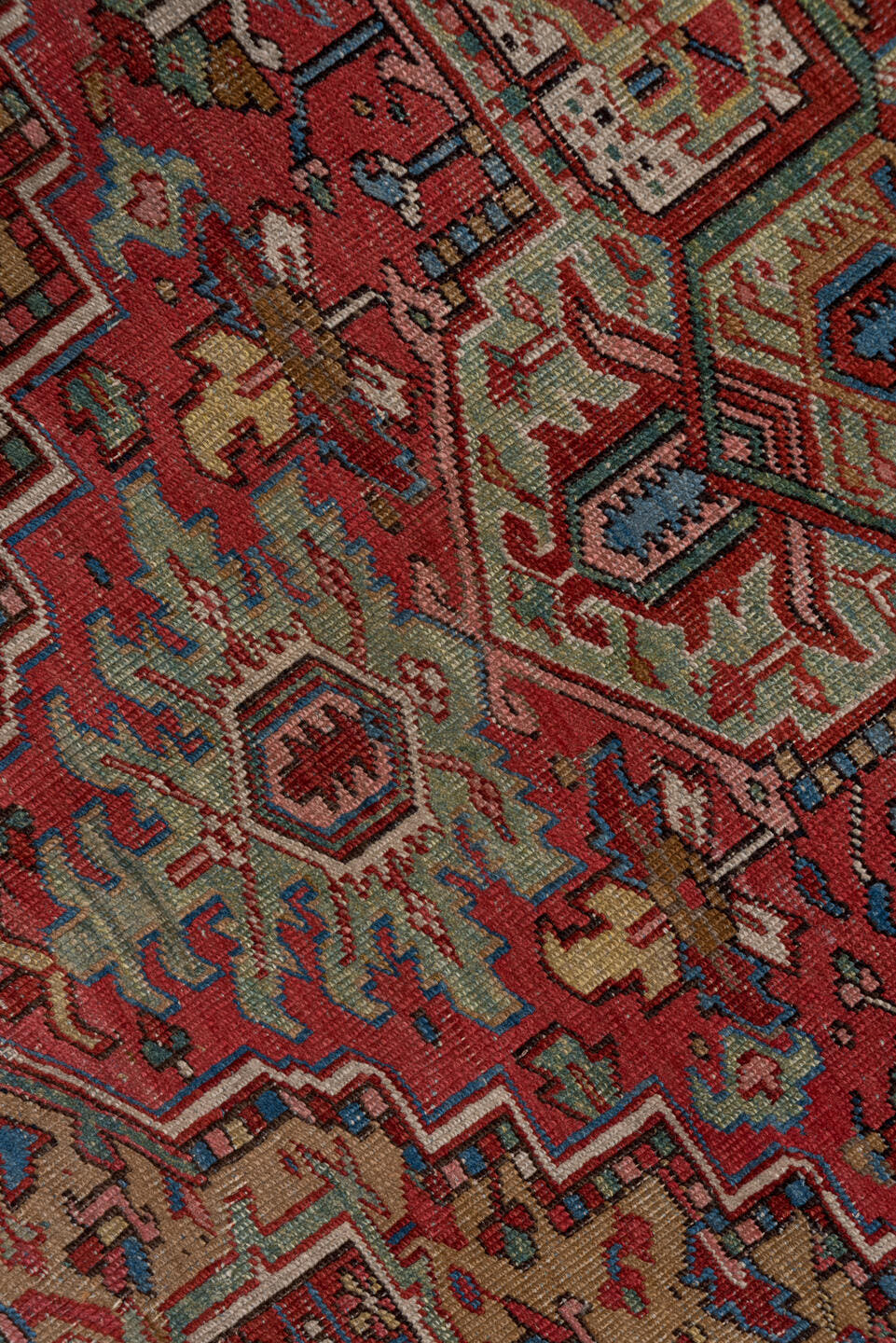 6' x 8' one-of-a-kind handmade antique Heriz medium size rug. Color palette: rust, sage, ivory, navy, rose, taupe, slate