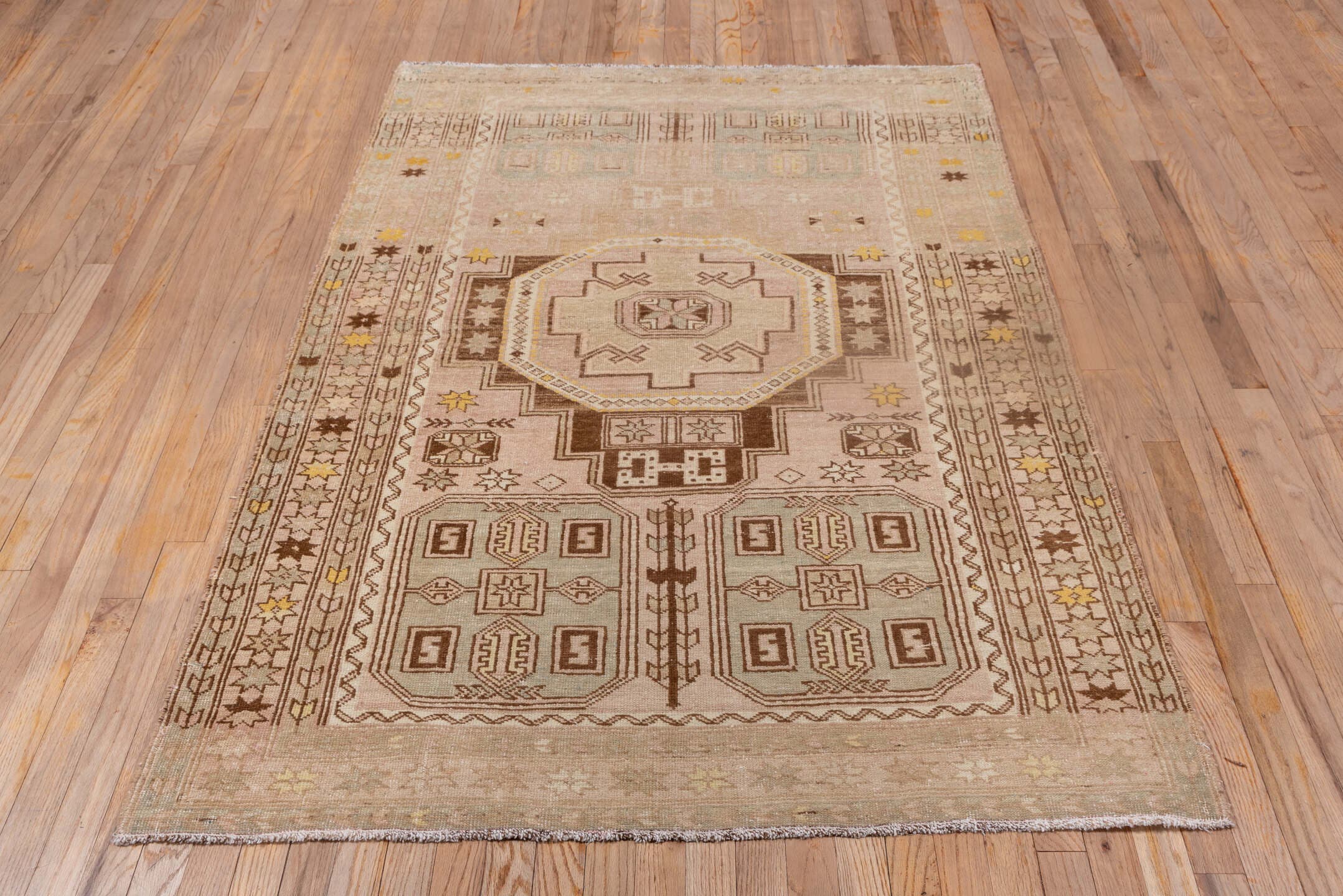 4' x 6' one-of-a-kind handmade antique Trans Caucasian small size rug. Color palette: ivory, taupe, brown, gold, beige, gray
