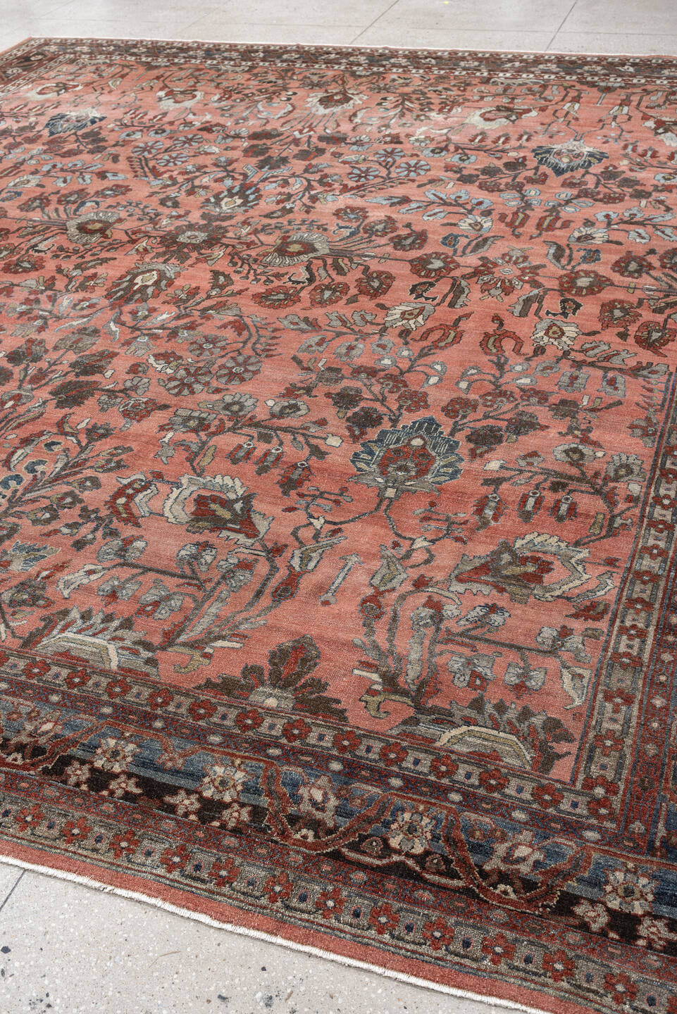 12' x 13' one-of-a-kind handmade antique Lilian oversize rug. Color palette: rose, indigo, ivory, brown, slate, terra cotta
