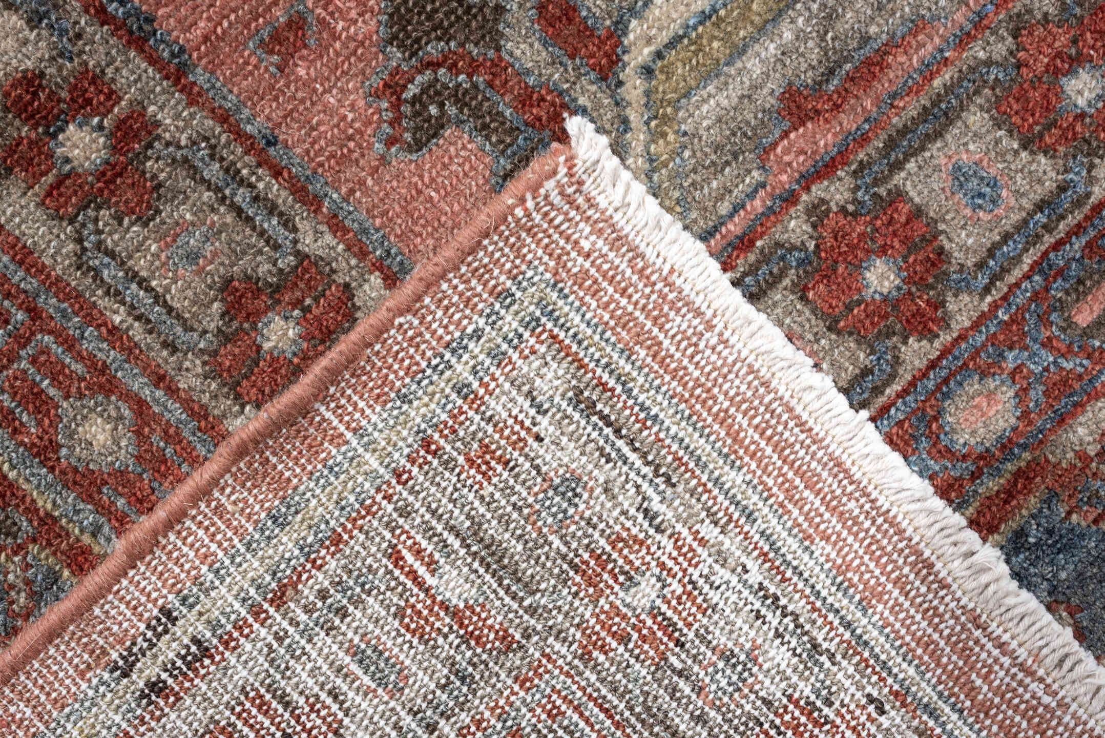 12' x 13' one-of-a-kind handmade antique Lilian oversize rug. Color palette: rose, indigo, ivory, brown, slate, terra cotta