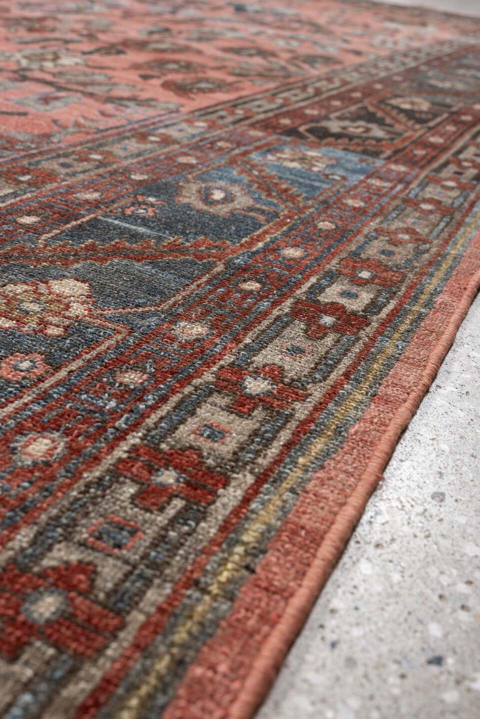 12' x 13' one-of-a-kind handmade antique Lilian oversize rug. Color palette: rose, indigo, ivory, brown, slate, terra cotta