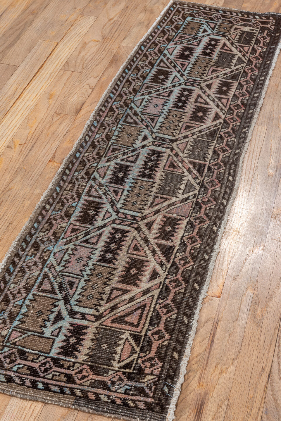 1' x 4' one-of-a-kind handmade vintage Hamadan small size rug. Color palette: brown, gray, light gray, off-white, pink, snow