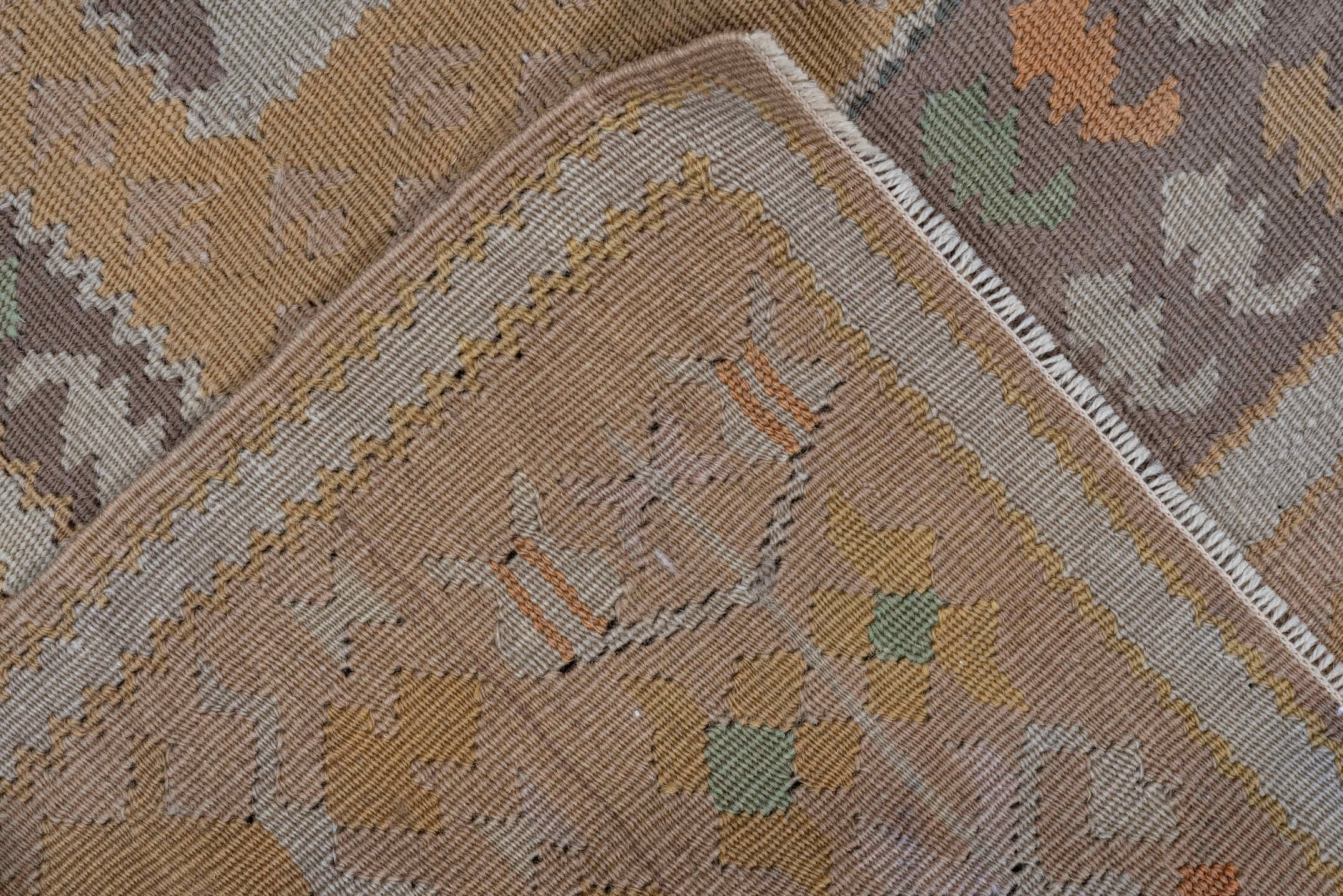 3' x 5' one-of-a-kind handmade antique Belouch small size rug. Color palette: taupe, camel, ivory, sage, terra cotta