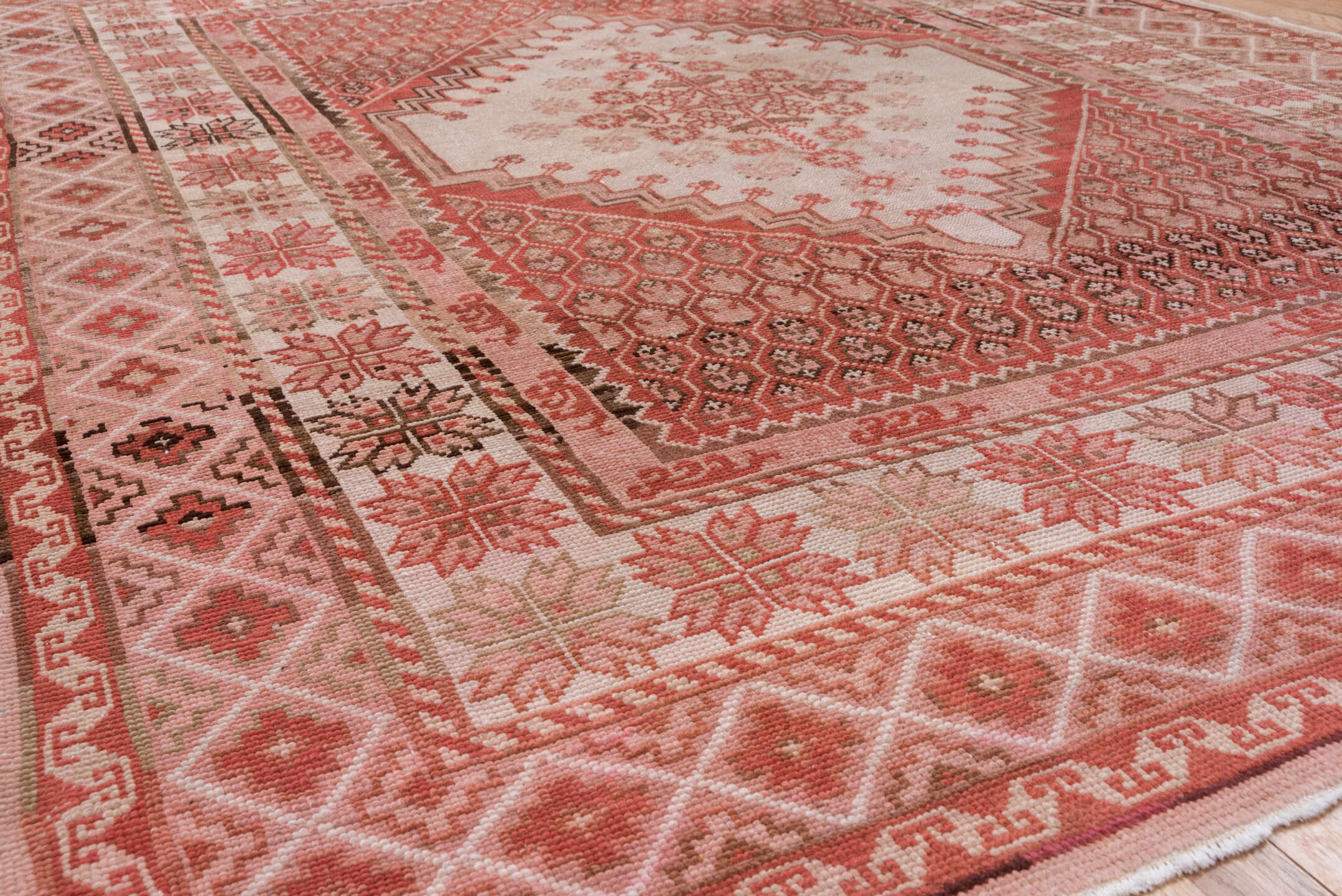 6' x 9' one-of-a-kind handmade antique Oushak medium size rug. Color palette: rose, terracotta, ivory, dusty pink, taupe