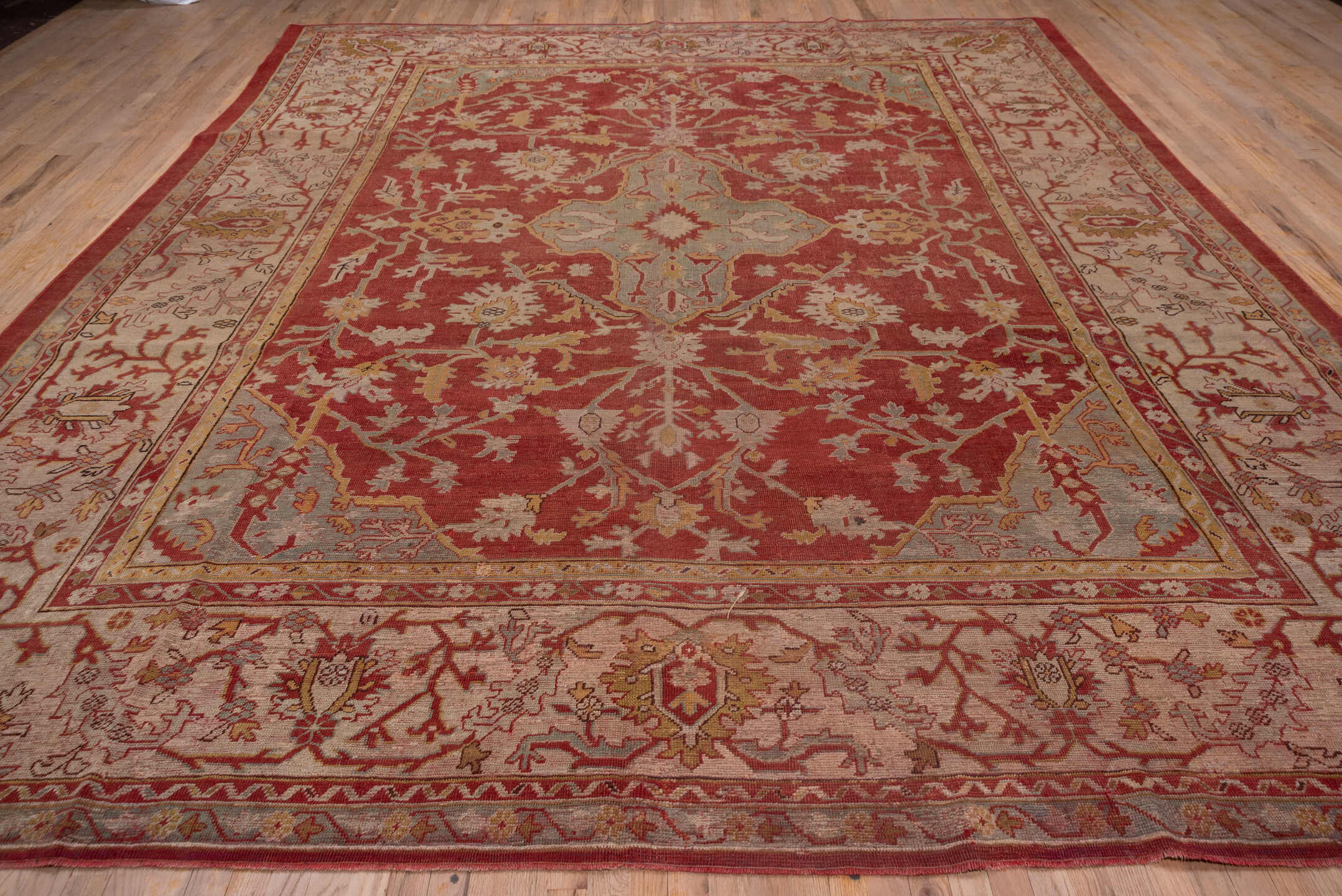 11' x 13' one-of-a-kind handmade antique Oushak oversize rug. Color palette: terra cotta, ivory, sage, gold, rust, blush